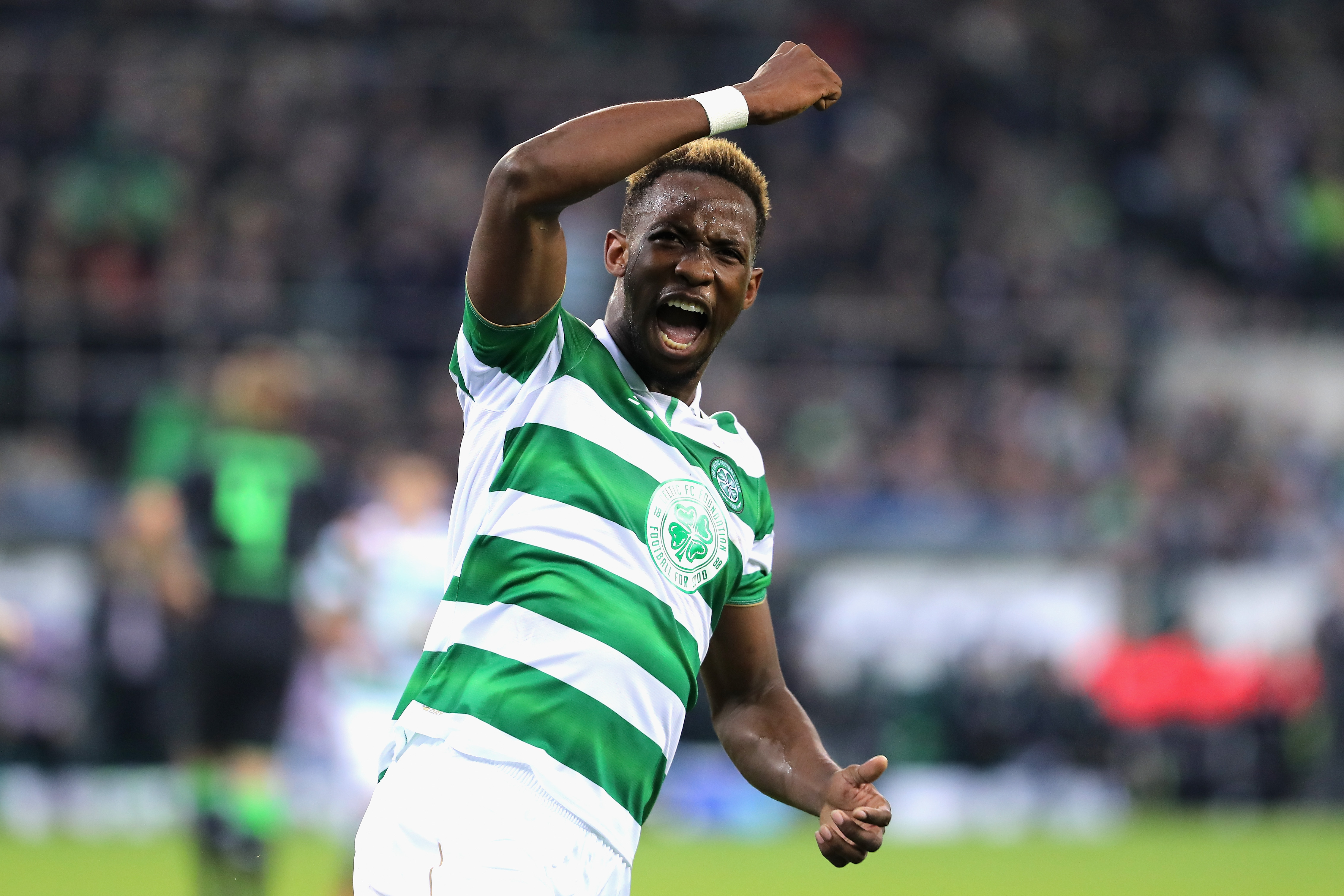 MOENCHENGLADBACH, GERMANY - NOVEMBER 01: Moussa Dembele of Celtic celebrates scoring his sides first goal during the UEFA Champions League Group C match between VfL Borussia Moenchengladbach and Celtic at Borussia-Park on November 1, 2016 in Moenchengladbach, Germany.  (Photo by Simon Hofmann/Bongarts/Getty Images)