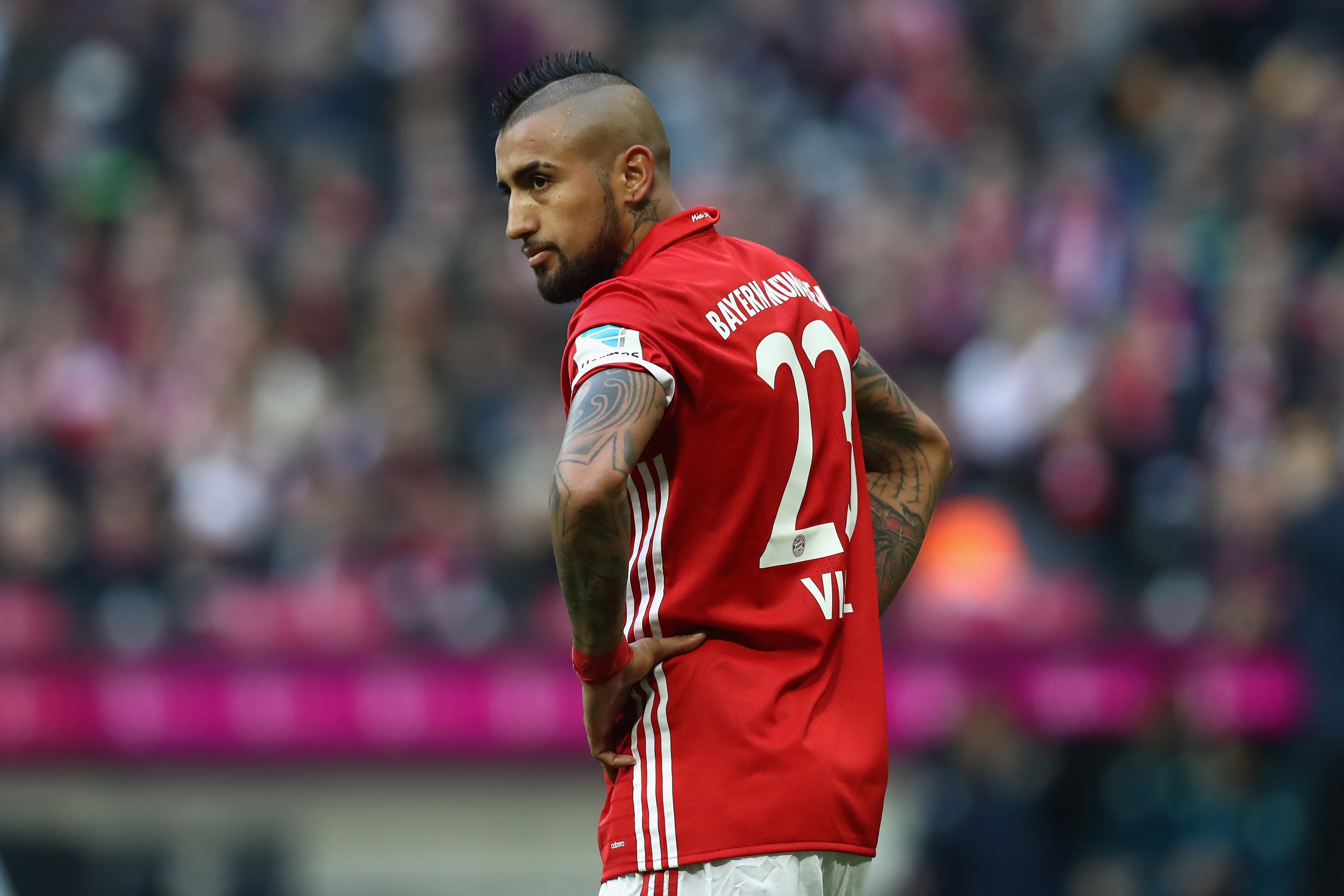 MUNICH, GERMANY - DECEMBER 10:  Arturo Vidal of Muenchen looks on during the Bundesliga match between Bayern Muenchen and VfL Wolfsburg at Allianz Arena on December 10, 2016 in Munich, Germany.  (Photo by Alexander Hassenstein/Bongarts/Getty Images)