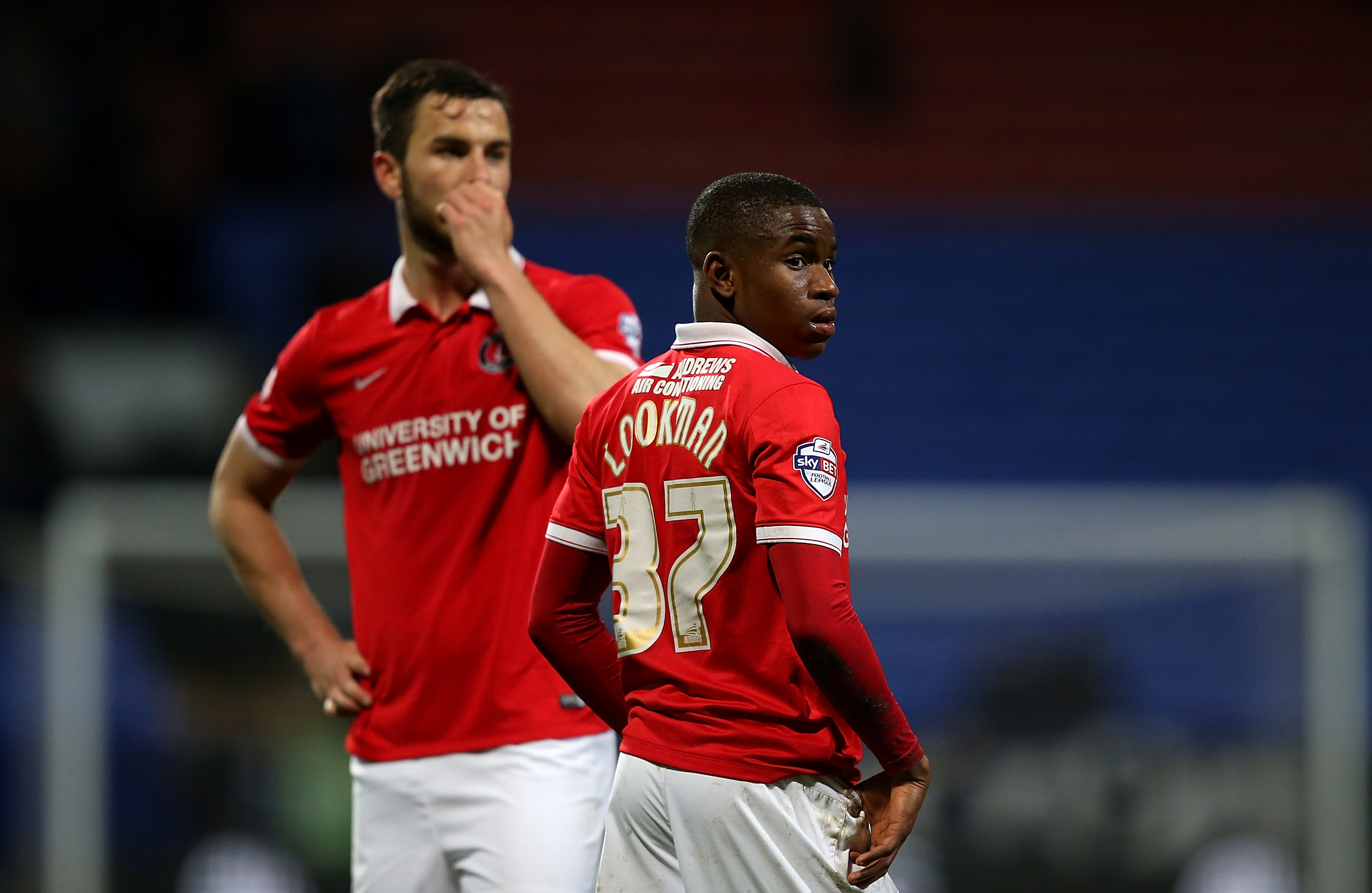 BOLTON, ENGLAND - APRIL 19:  Ademola Lookman of Charlton Athletic looks on at the end of the match as the travelling support shout abuse at the players during the Sky Bet Championship match between Bolton Wanderers and Charlton Athletic at Reebok Stadium on April 19, 2016 in Bolton, United Kingdom.  (Photo by Jan Kruger/Getty Images)