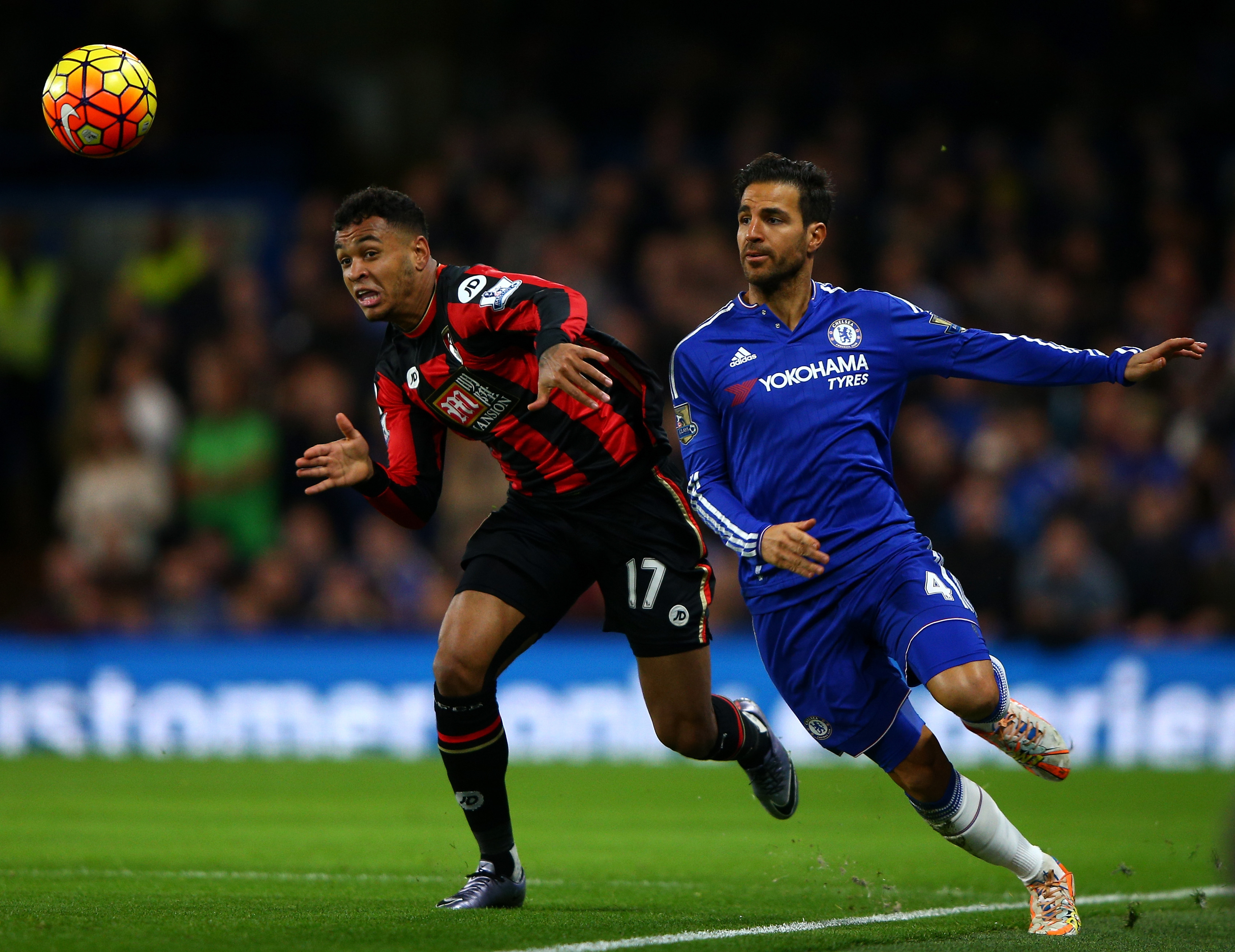 LONDON, ENGLAND - DECEMBER 05: Joshua King of Bournemouth and Cesc Fabregas of Chelsea compete for the ball during the Barclays Premier League match between Chelsea and A.F.C. Bournemouth at Stamford Bridge on December 5, 2015 in London, England.  (Photo by Ian Walton/Getty Images)