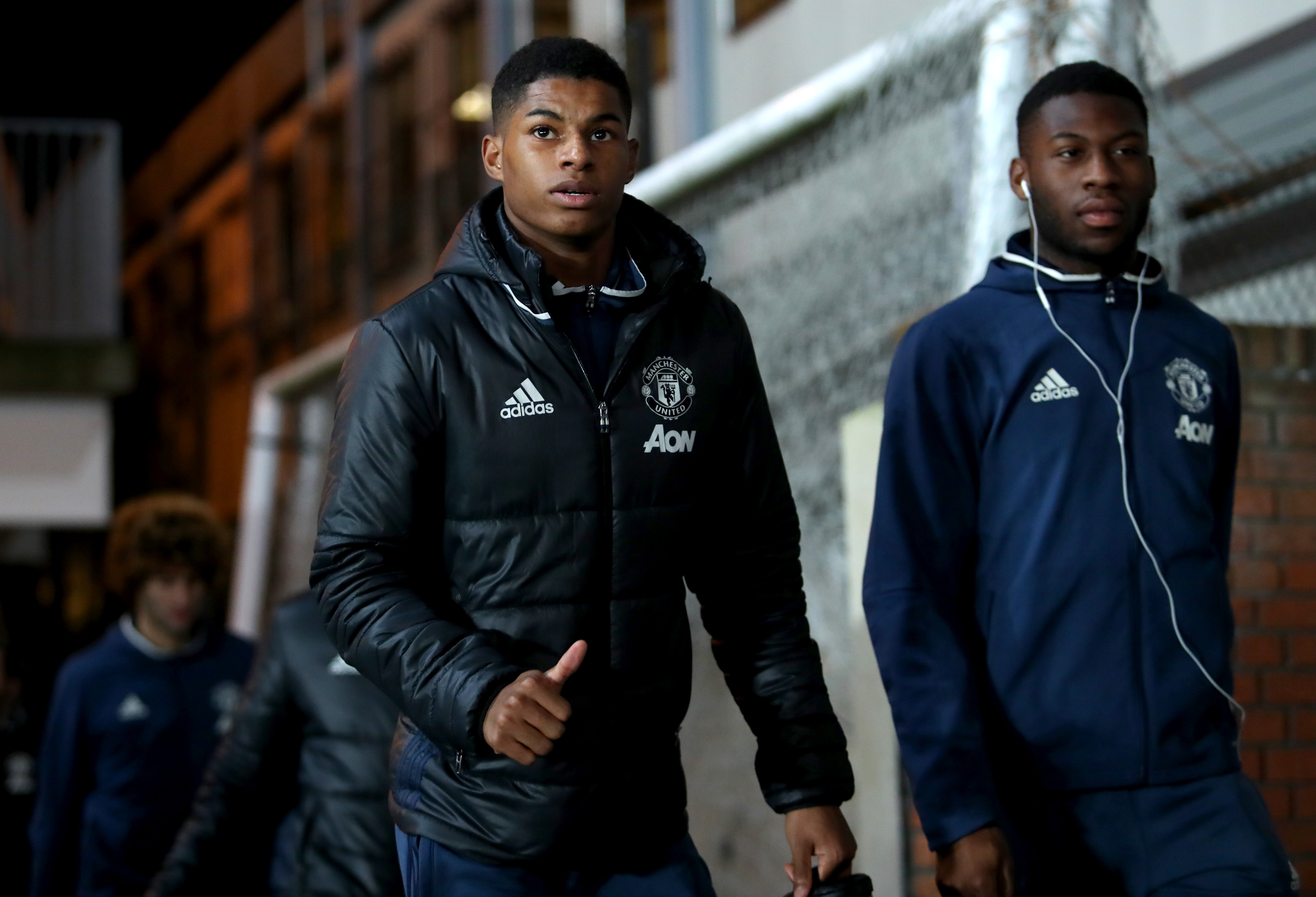 LONDON, ENGLAND - DECEMBER 14:  Marcus Rashford (L) of Manchester United thumbs up on arrival at the stadium prior to the Premier League match between Crystal Palace and Manchester United at Selhurst Park on December 14, 2016 in London, England.  (Photo by Christopher Lee/Getty Images)