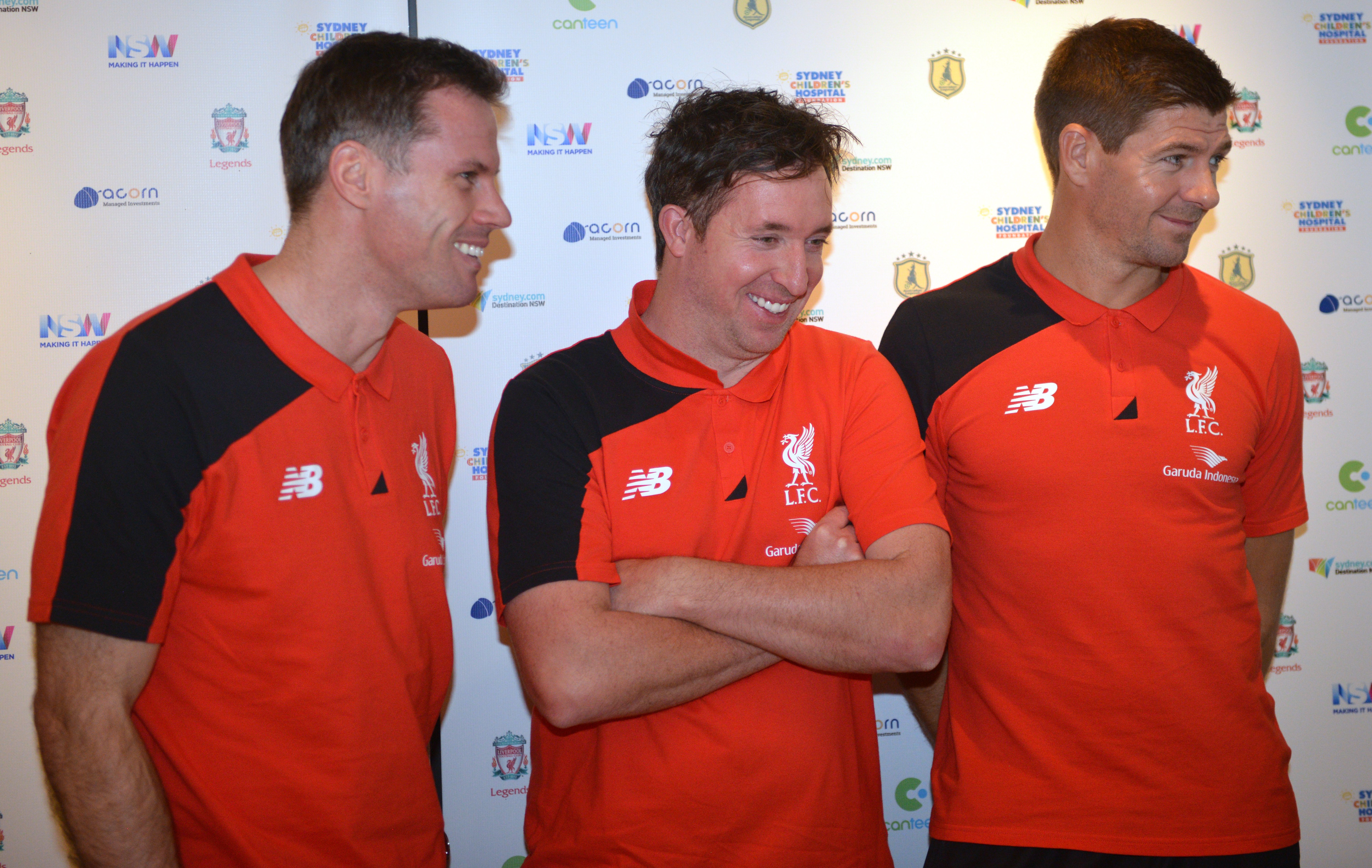 Former Liverpool football stars Steven Gerrard (R) Jamie Carragher (L) and Robbie Fowler (C) attend a press conference in Sydney on January 6, 2016.  Gerrard will pull on the famous Reds shirt once again when he plays for the club's 'Legends' side with Carragher and Fowler against Australia Legends in Sydney on January 7, 2016. AFP PHOTO / Peter PARKS  IMAGE STRICTLY FOR EDITORIAL USE - STRICTLY NO COMMERCIAL USE / AFP / PETER PARKS        (Photo credit should read PETER PARKS/AFP/Getty Images)