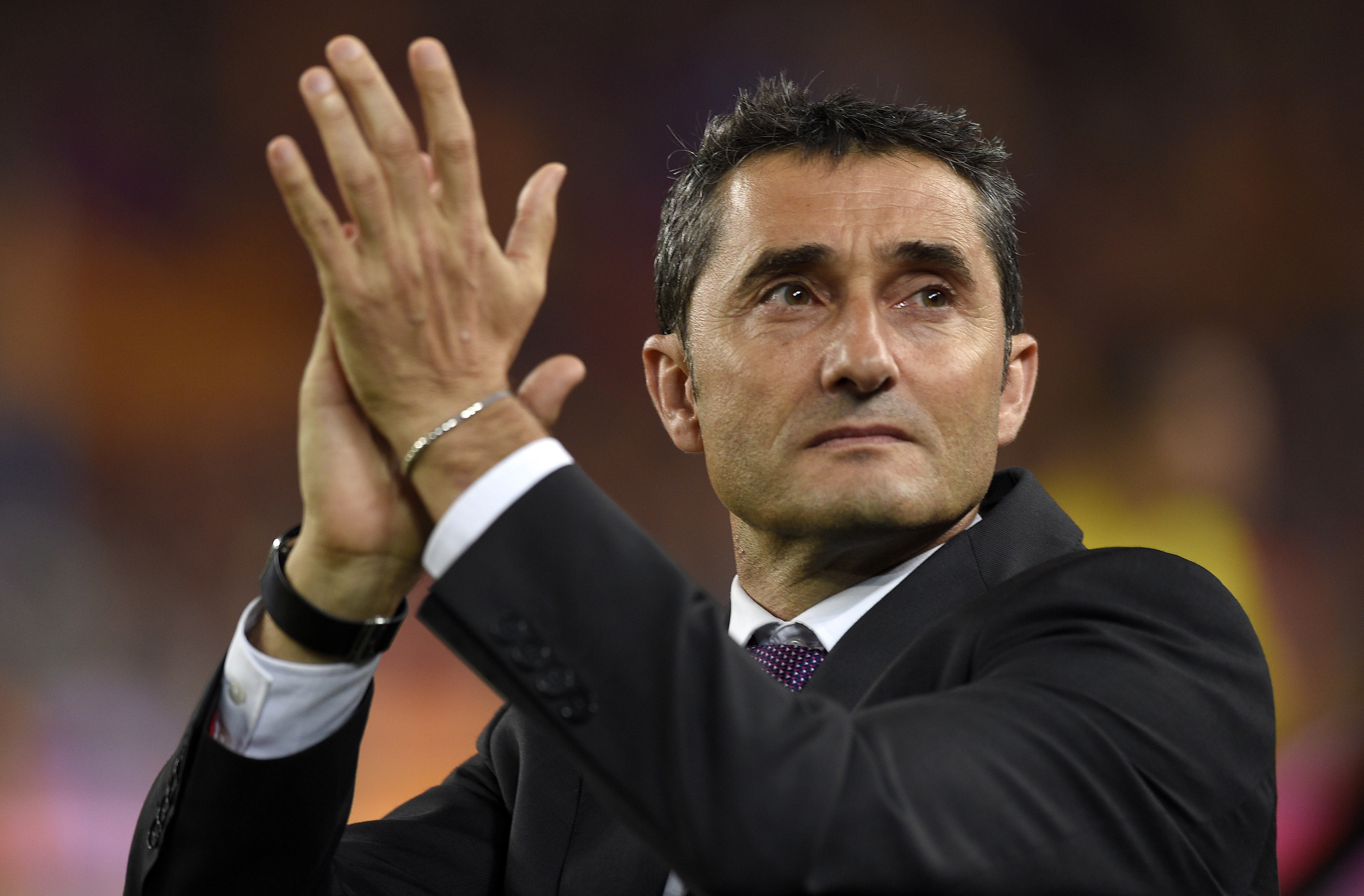 Athletic Bilbao's coach Ernesto Valverde applauds at the end of the Spanish Copa del Rey (King's Cup) final football match Athletic Club Bilbao vs FC Barcelona at the Camp Nou stadium in Barcelona on May 30, 2015. Barcelona won 3-1.  AFP PHOTO/ LLUIS GENE        (Photo credit should read LLUIS GENE/AFP/Getty Images)