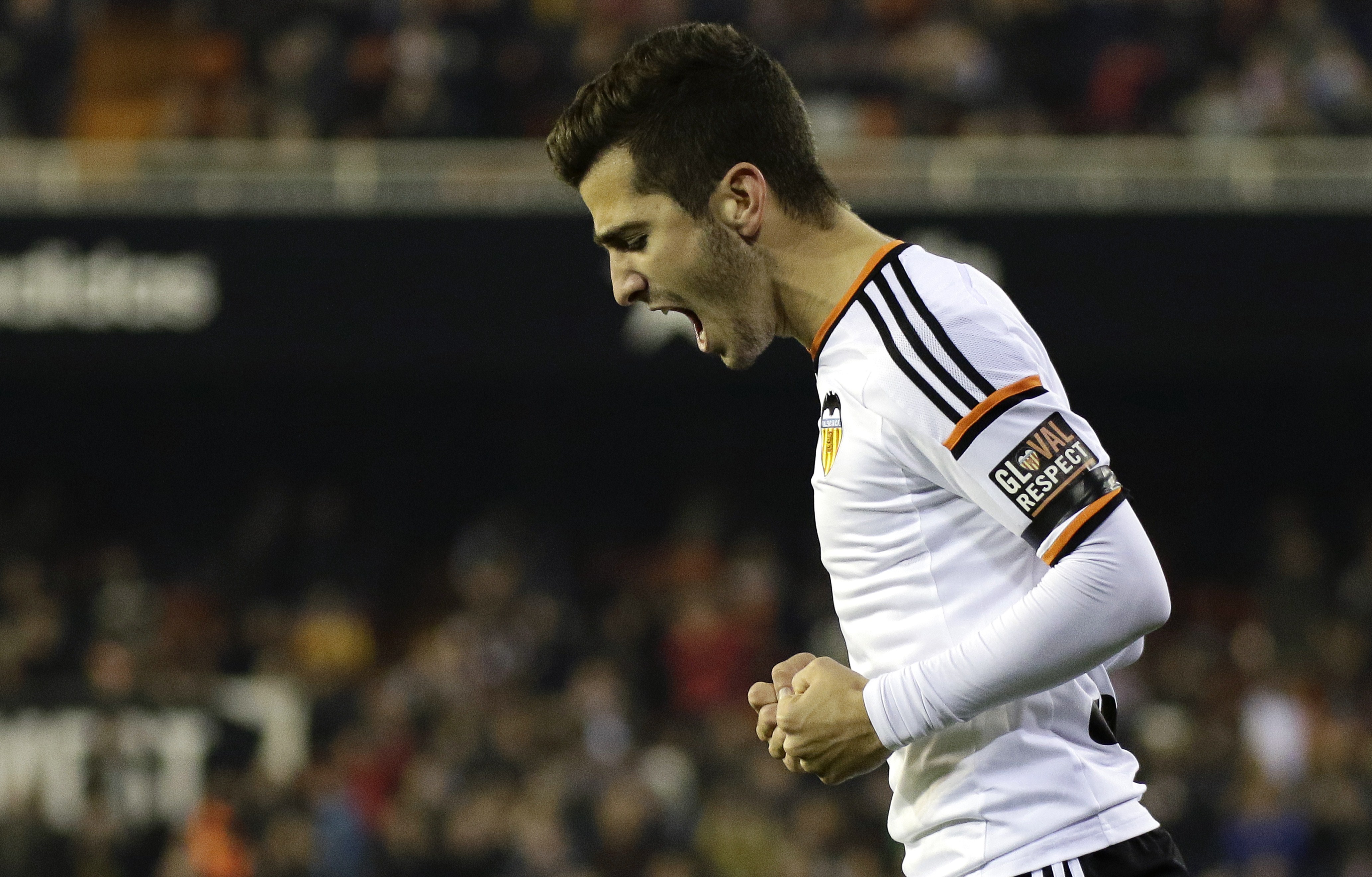 Valencia's defender Jose Gaya celebrates his goal during the Spanish Copa del Rey (King's Cup) round of 16 first leg football match Valencia CF vs RCD Espanyol at the Mestalla stadium in Valencia on January 7, 2015.     AFP PHOTO/ JOSE JORDAN        (Photo credit should read JOSE JORDAN/AFP/Getty Images)