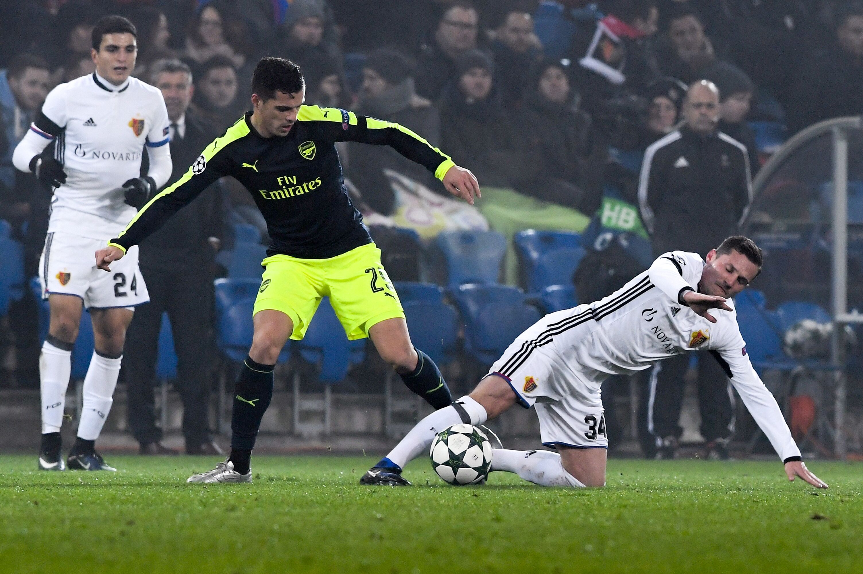 Arsenal's Swiss midfielder Granit Xhaka (C) vies with Basel's Albanian midfielder Taulant Xhaka during the UEFA Champions league Group A football match between FC Basel 1893 and Arsenal FC on December 6, 2016 at the St Jakob Park stadium in Basel. / AFP / Patrick HERTZOG        (Photo credit should read PATRICK HERTZOG/AFP/Getty Images)