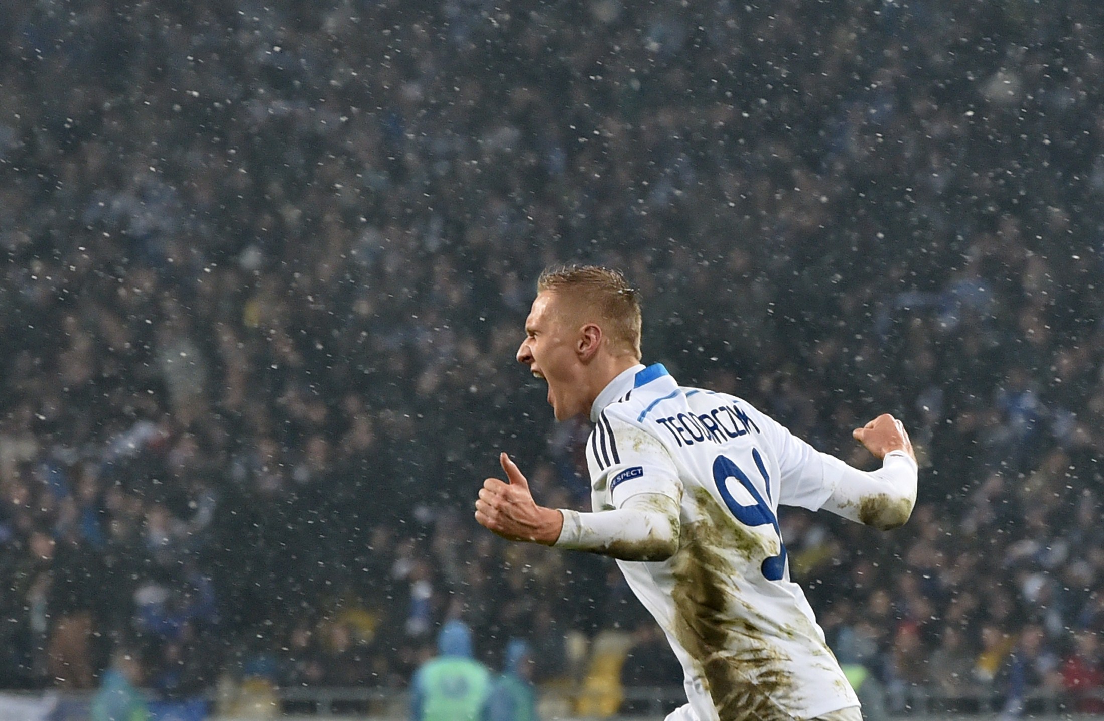 Lukasz Teodorczyk  of Dynamo Kiev celebrates after scoring a goal during the UEFA Europa League, Round of 32 football match FC Dynamo Kiev vs Guingamp in Kiev on February 26, 2015. AFP PHOTO/ SERGEI SUPINSKY        (Photo credit should read SERGEI SUPINSKY/AFP/Getty Images)