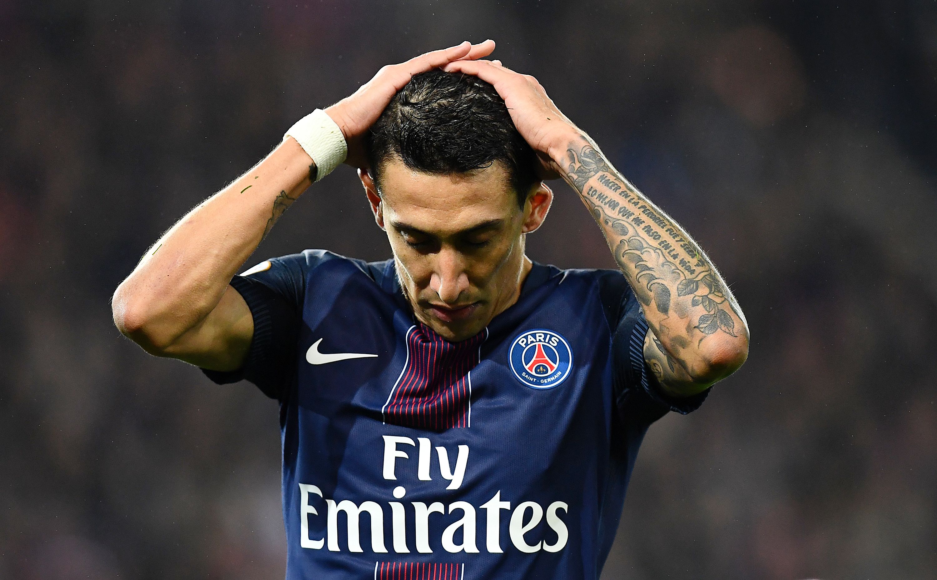 Paris Saint-Germain's Argentinian forward Angel Di Maria reacts to a missed shot during the French L1 football match between Paris Saint-Germain and Olympique of Marseille at the Parc des Princes stadium in Paris on October 23, 2016.  / AFP / FRANCK FIFE        (Photo credit should read FRANCK FIFE/AFP/Getty Images)