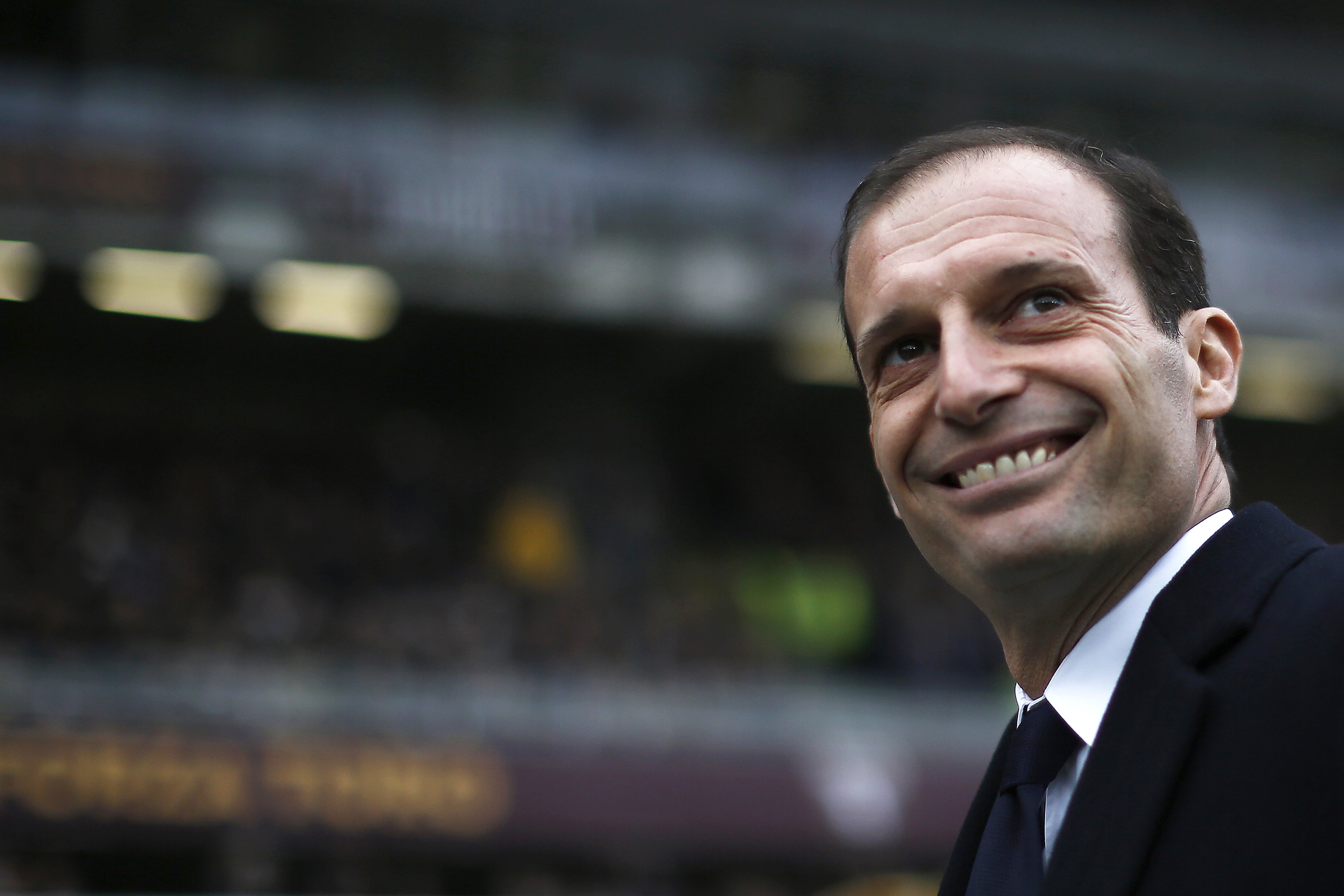 Juventus' coach Massimiliano Allegri looks on during the Italian Serie A football match between Torino and Juventus at the Grande Torino Stadium in Turin on December 11, 2016. / AFP / MARCO BERTORELLO        (Photo credit should read MARCO BERTORELLO/AFP/Getty Images)