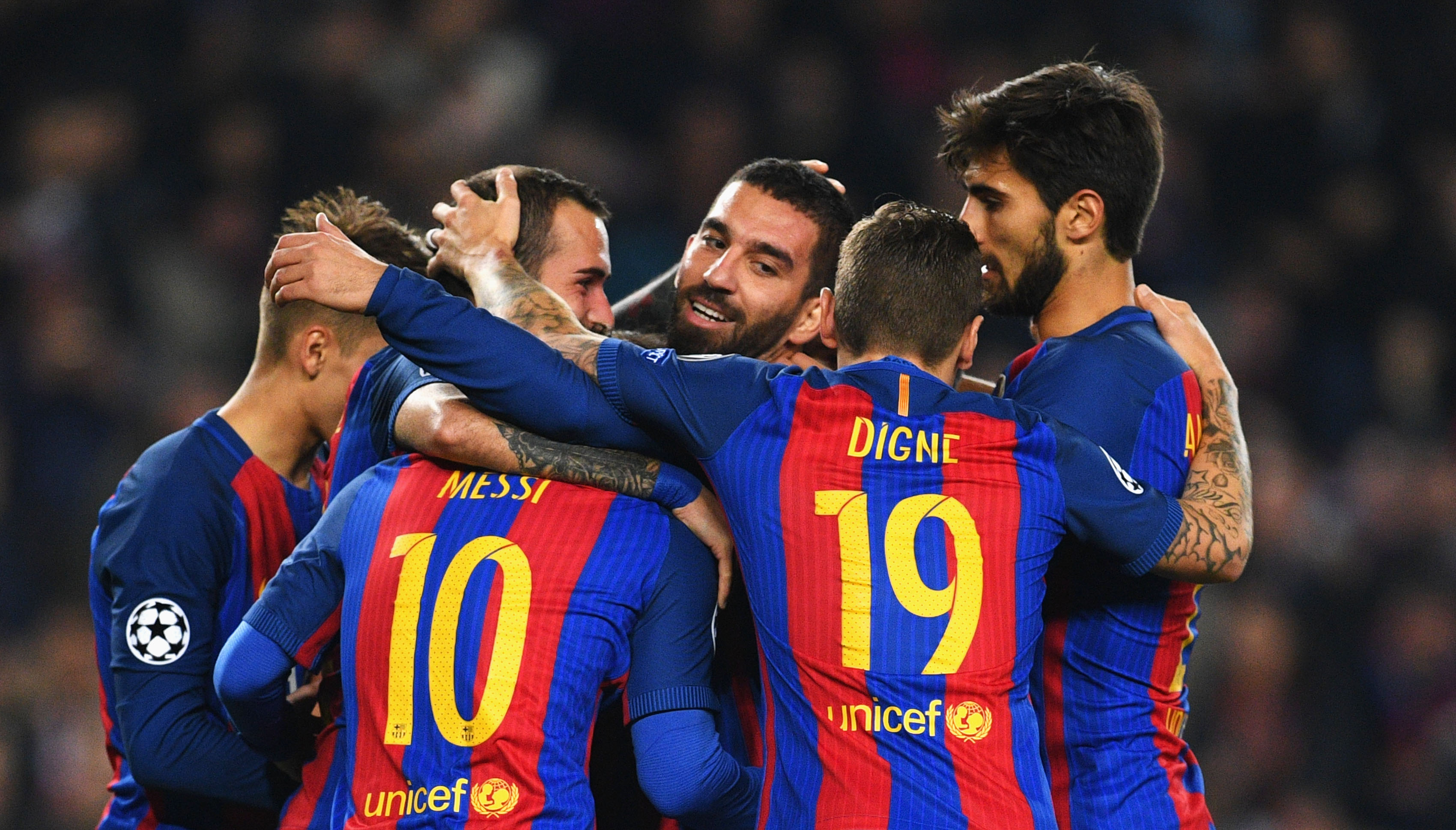 BARCELONA, SPAIN - DECEMBER 06:  Arda Turan of Barcelona (C) celebrates with team mates as he scores their third goal during the UEFA Champions League Group C match between FC Barcelona and VfL Borussia Moenchengladbach at Camp Nou on December 6, 2016 in Barcelona, .  (Photo by David Ramos/Getty Images)