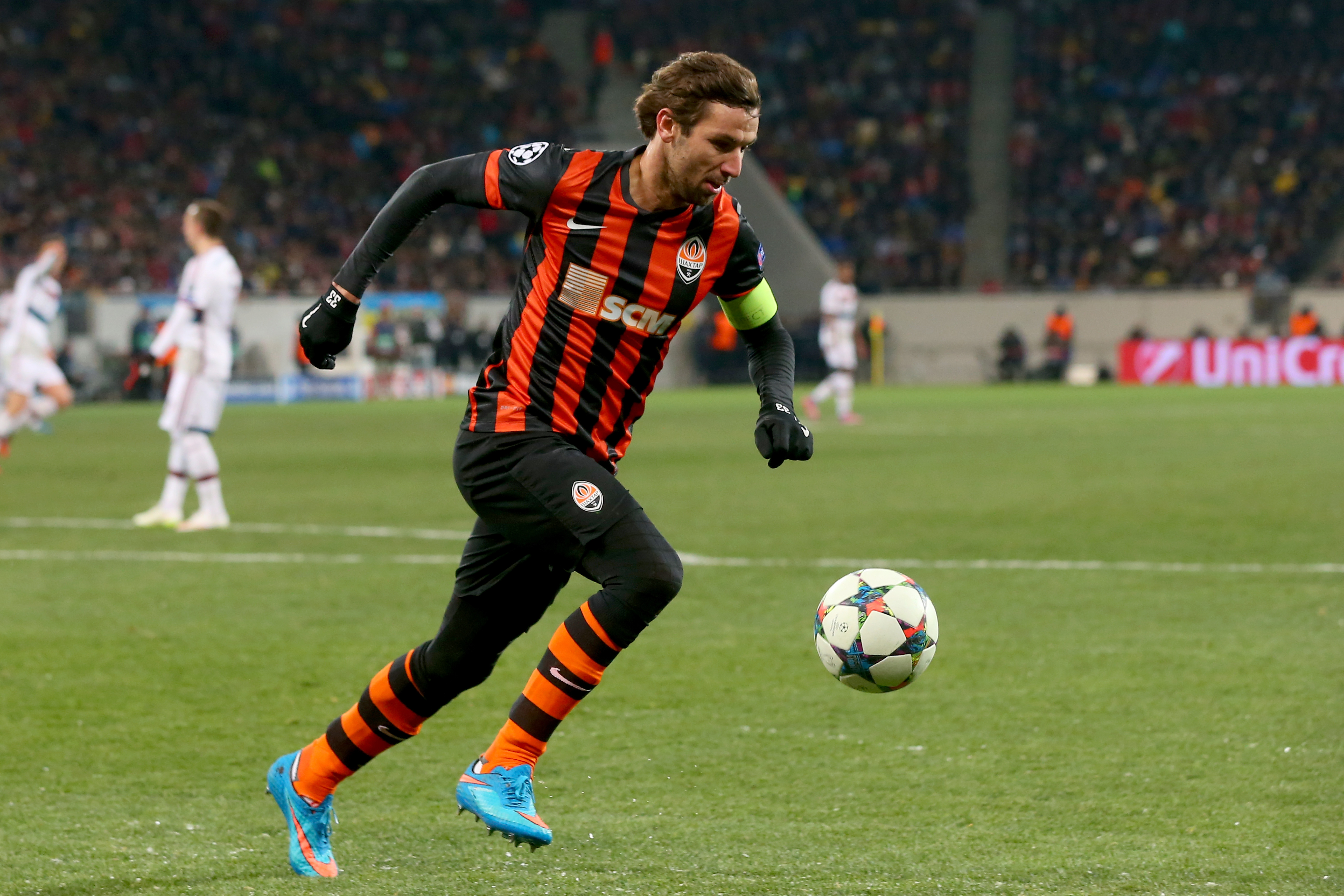 LVIV, UKRAINE - FEBRUARY 17:  Darijo Srna of Donetsk runs with the ball during the UEFA Champions League round of 16 first leg match between FC Shakhtar Donetsk and FC Bayern Muenchen at Arena Lviv on February 17, 2015 in Lviv, Ukraine.  (Photo by Alexander Hassenstein/Bongarts/Getty Images)