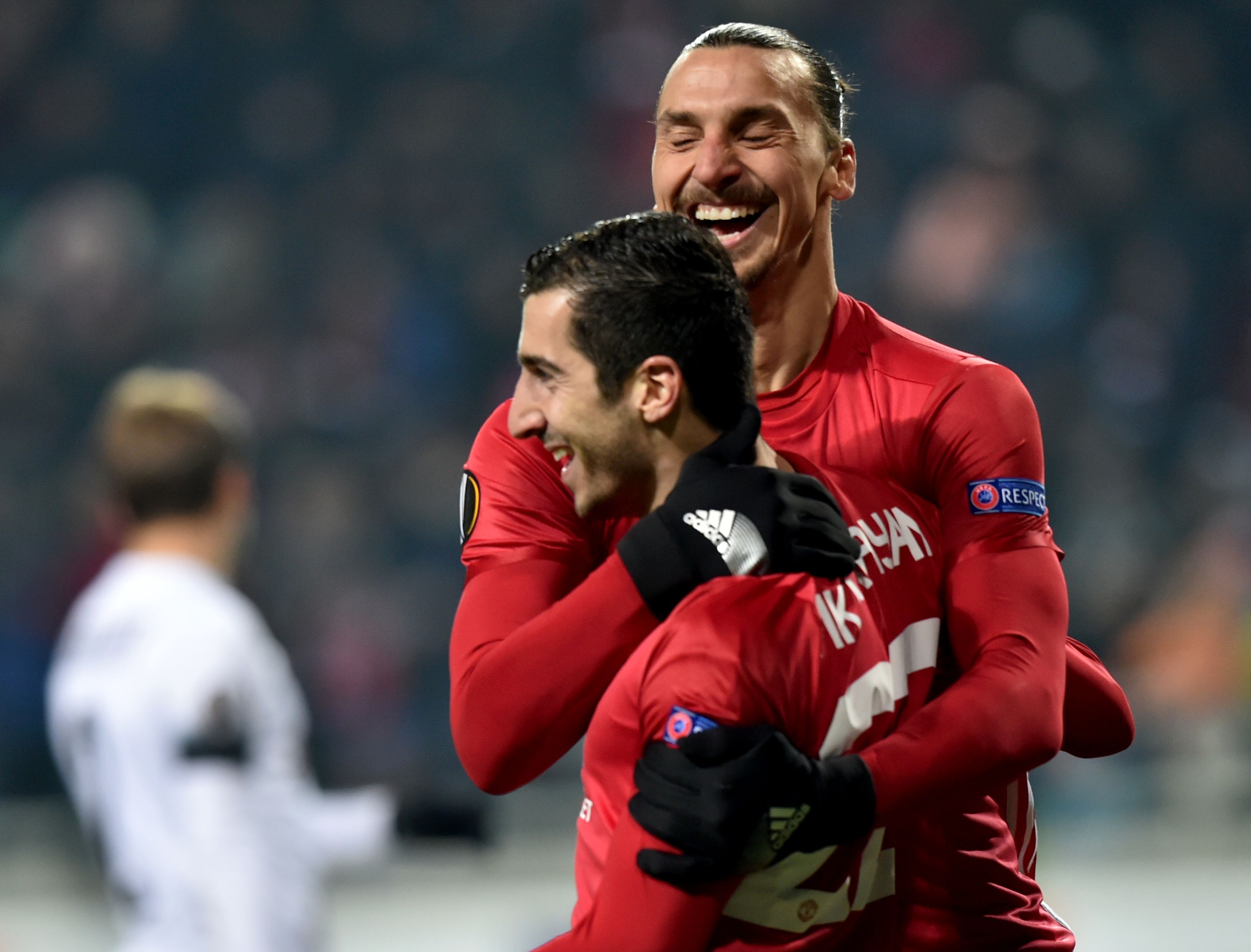 Manchester United's Armenian midfielder Henrikh Mkhitaryan (L) celebrates after scoring a goal, with teammate Swedish forward Zlatan Ibrahimovic during the UEFA Europa League football match between FC Zorya Luhansk and Manchester United FC at the Chornomorets stadium in Odessa on December 8, 2016 / AFP / Sergei SUPINSKY        (Photo credit should read SERGEI SUPINSKY/AFP/Getty Images)