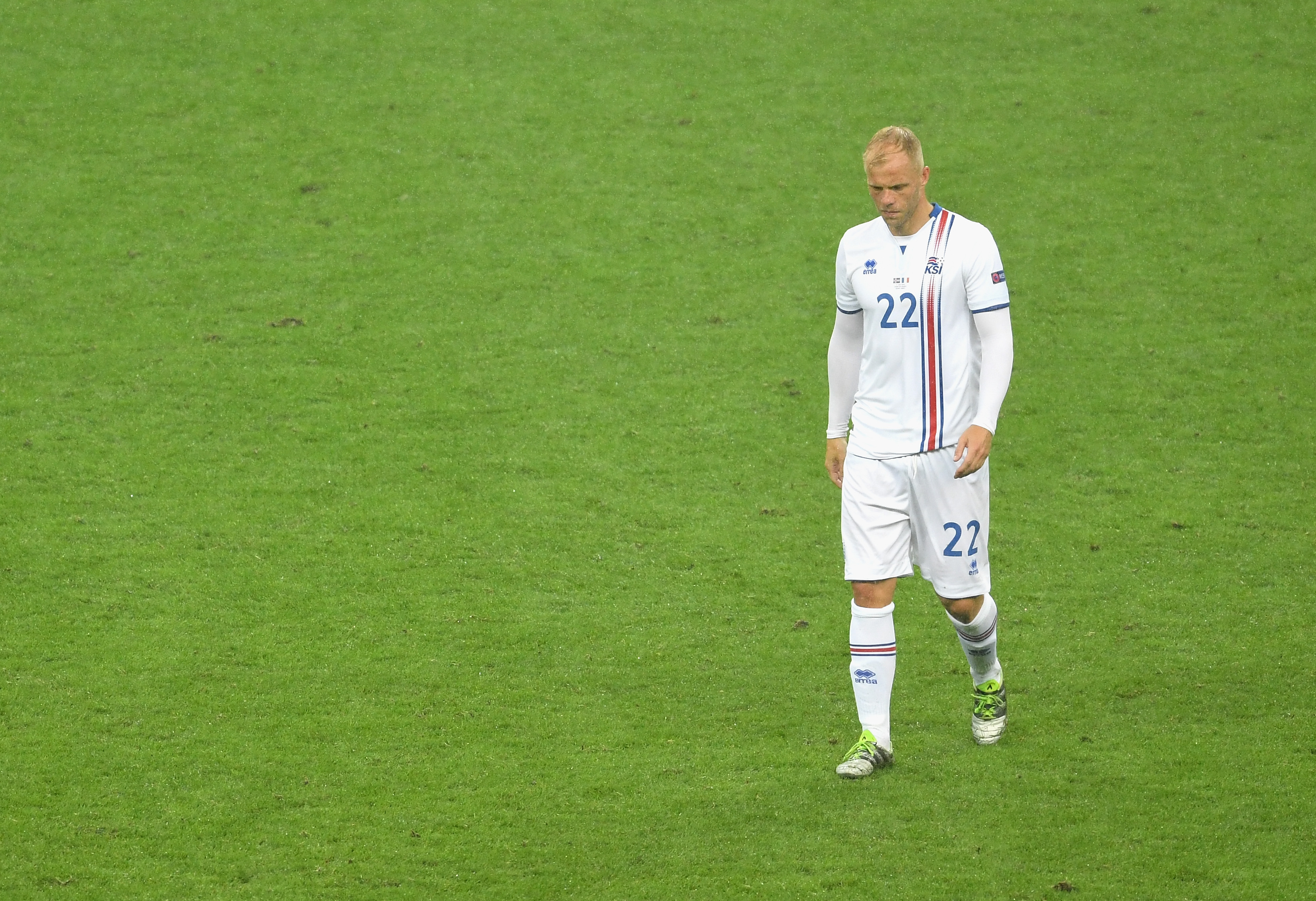 PARIS, FRANCE - JULY 03: Eidur Gudjohnsen of Iceland leaves the pitch after his team's 2-5 defeat in the UEFA EURO 2016 quarter final match between France and Iceland at Stade de France on July 3, 2016 in Paris, France.  (Photo by Michael Regan/Getty Images)