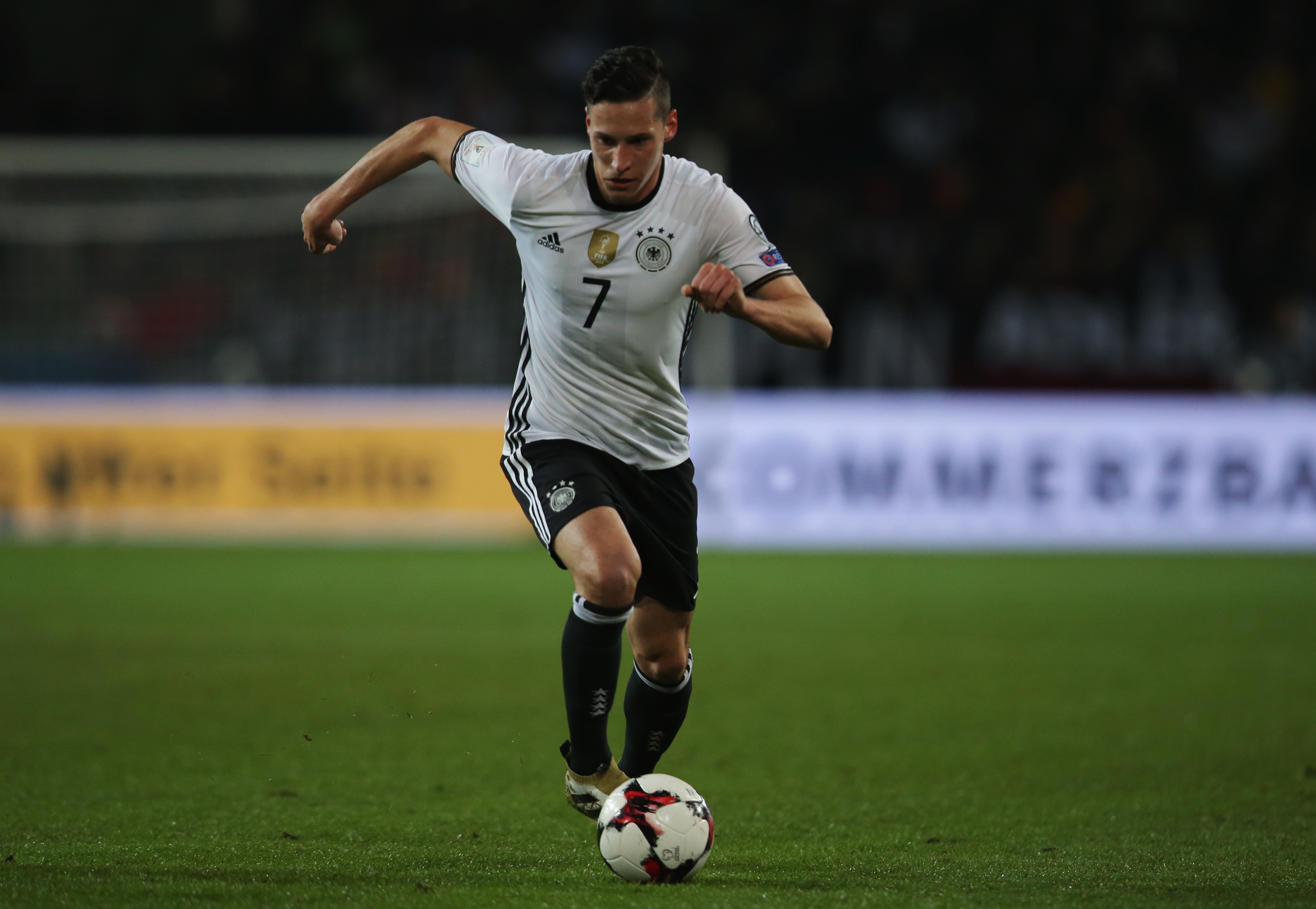HANOVER, GERMANY - OCTOBER 11:  Julian Draxler of Germany controls the ball during the FIFA 2018 World Cup Qualifier between Germany and Northern Ireland at HDI-Arena on October 11, 2016 in Hanover, Germany.  (Photo by Joern Pollex/Bongarts/Getty Images)