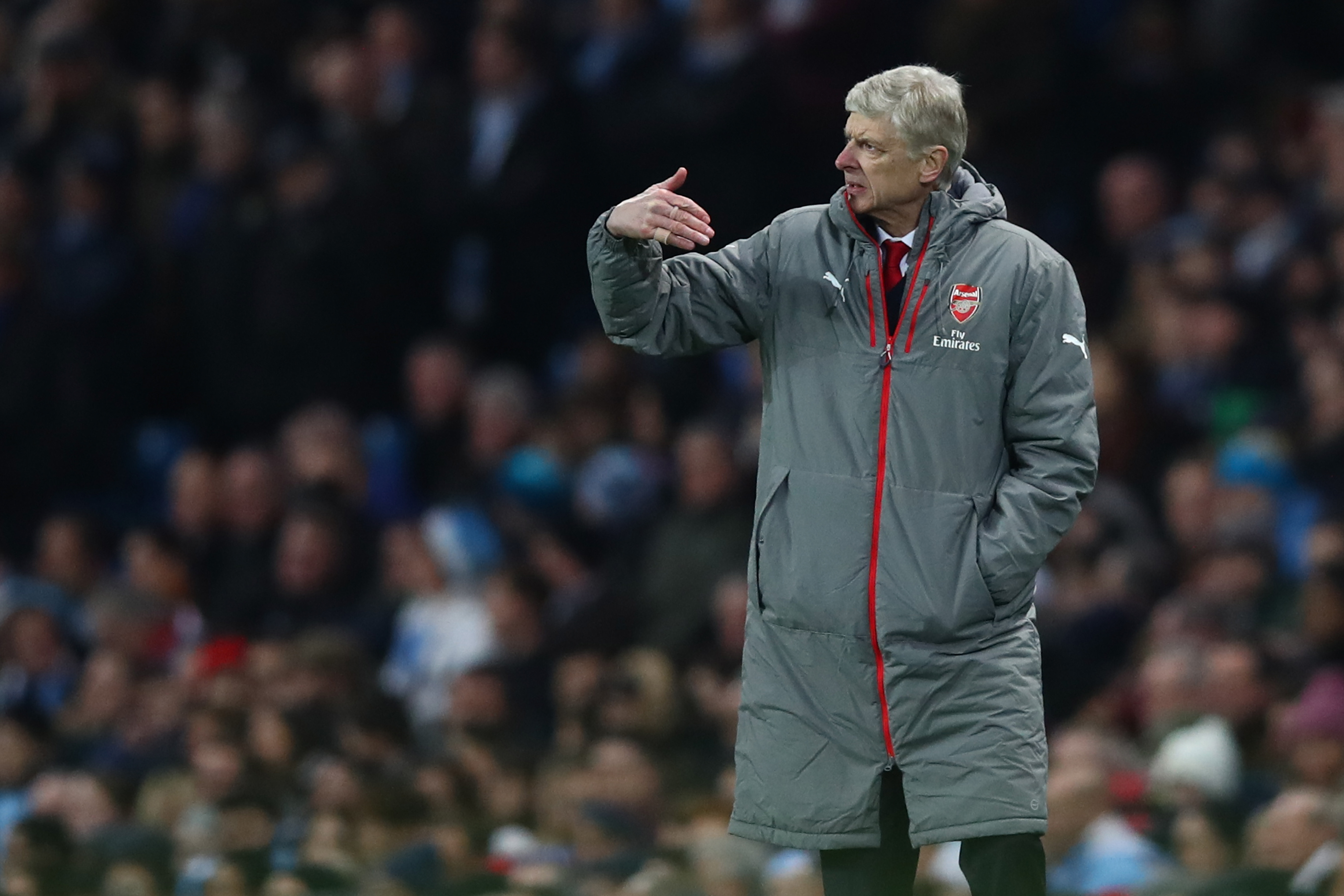 MANCHESTER, ENGLAND - DECEMBER 18: Arsene Wenger, Manager of Arsenal gives his team instructions during the Premier League match between Manchester City and Arsenal at the Etihad Stadium on December 18, 2016 in Manchester, England.  (Photo by Clive Brunskill/Getty Images)