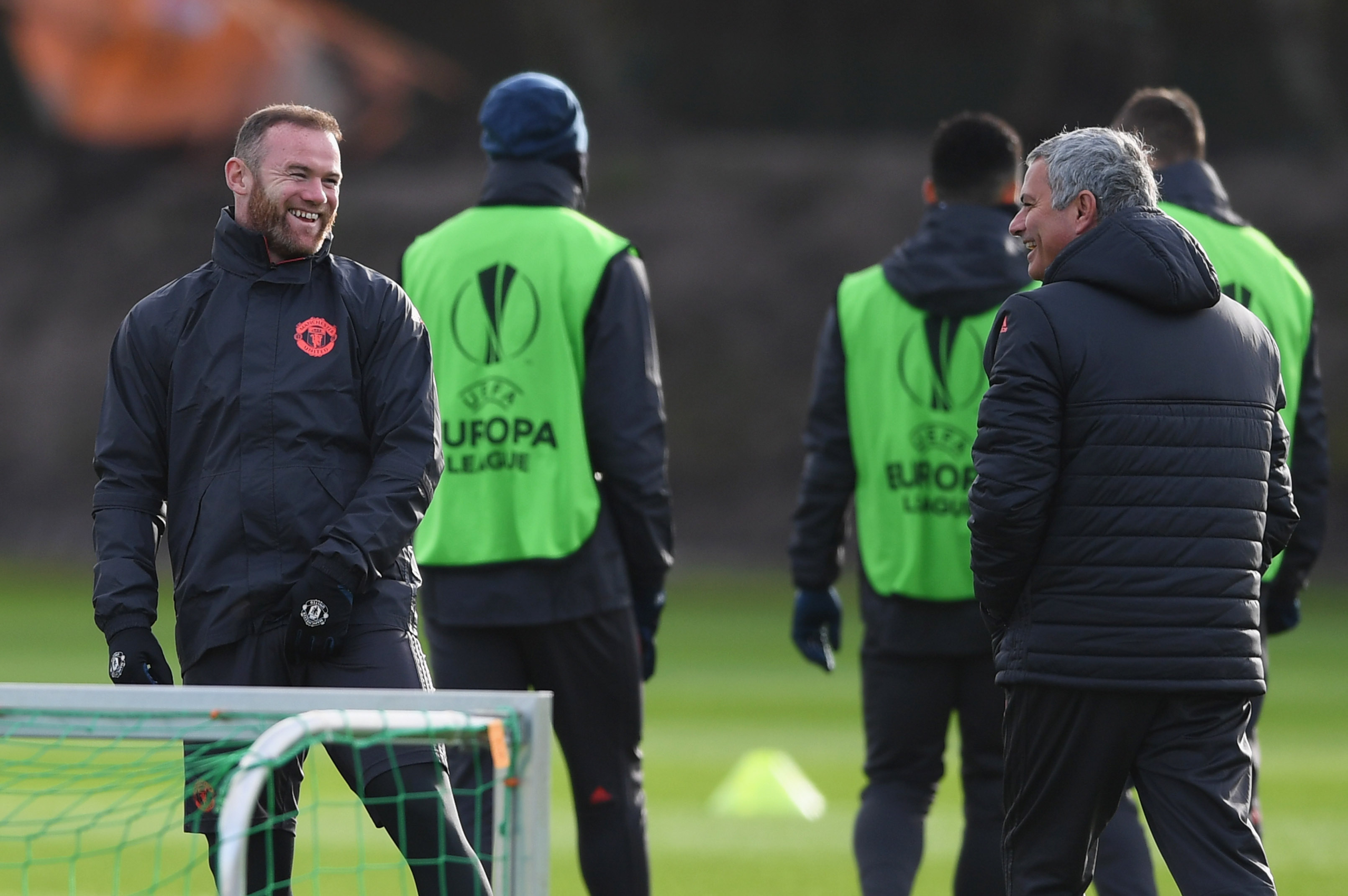 MANCHESTER, ENGLAND - NOVEMBER 23:  Wayne Rooney and Jose Mourinho manager of Manchester United smile during a Manchester United training session on the eve of their UEFA Europa League match against Feyenoord at Aon Training Complex on November 23, 2016 in Manchester, England.  (Photo by Gareth Copley/Getty Images)