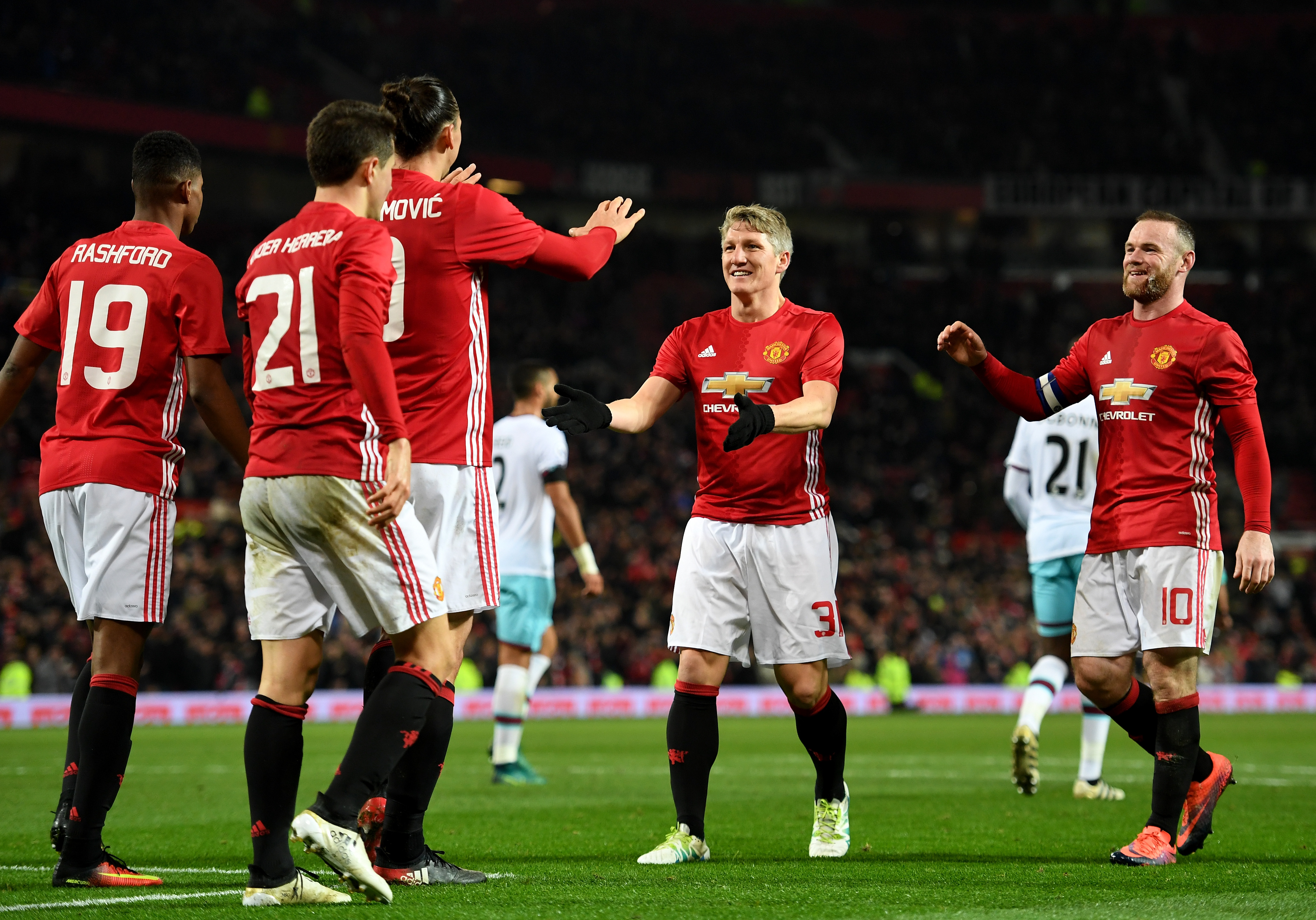 MANCHESTER, ENGLAND - NOVEMBER 30:  Zlatan Ibrahimovic of Manchester United celebrates with team mates after scoring his team's fourth goal of the game during the EFL Cup quarter final match between Manchester United and West Ham United at Old Trafford on November 30, 2016 in Manchester, England.  (Photo by Shaun Botterill/Getty Images)