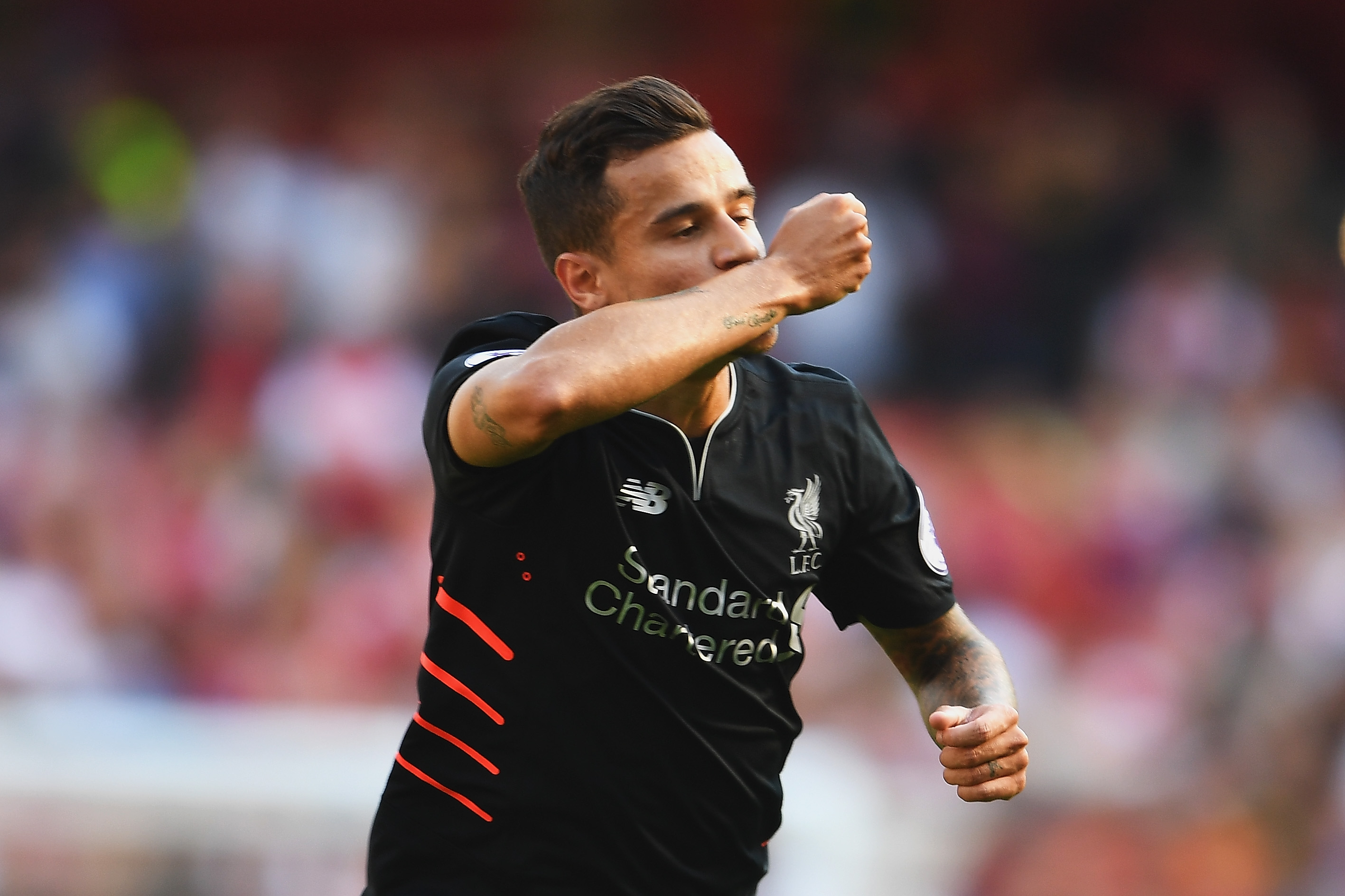 LONDON, ENGLAND - AUGUST 14:  Philippe Coutinho of Liverpool celebrates scoring his free kick during the Premier League match between Arsenal and Liverpool at Emirates Stadium on August 14, 2016 in London, England.  (Photo by Mike Hewitt/Getty Images)