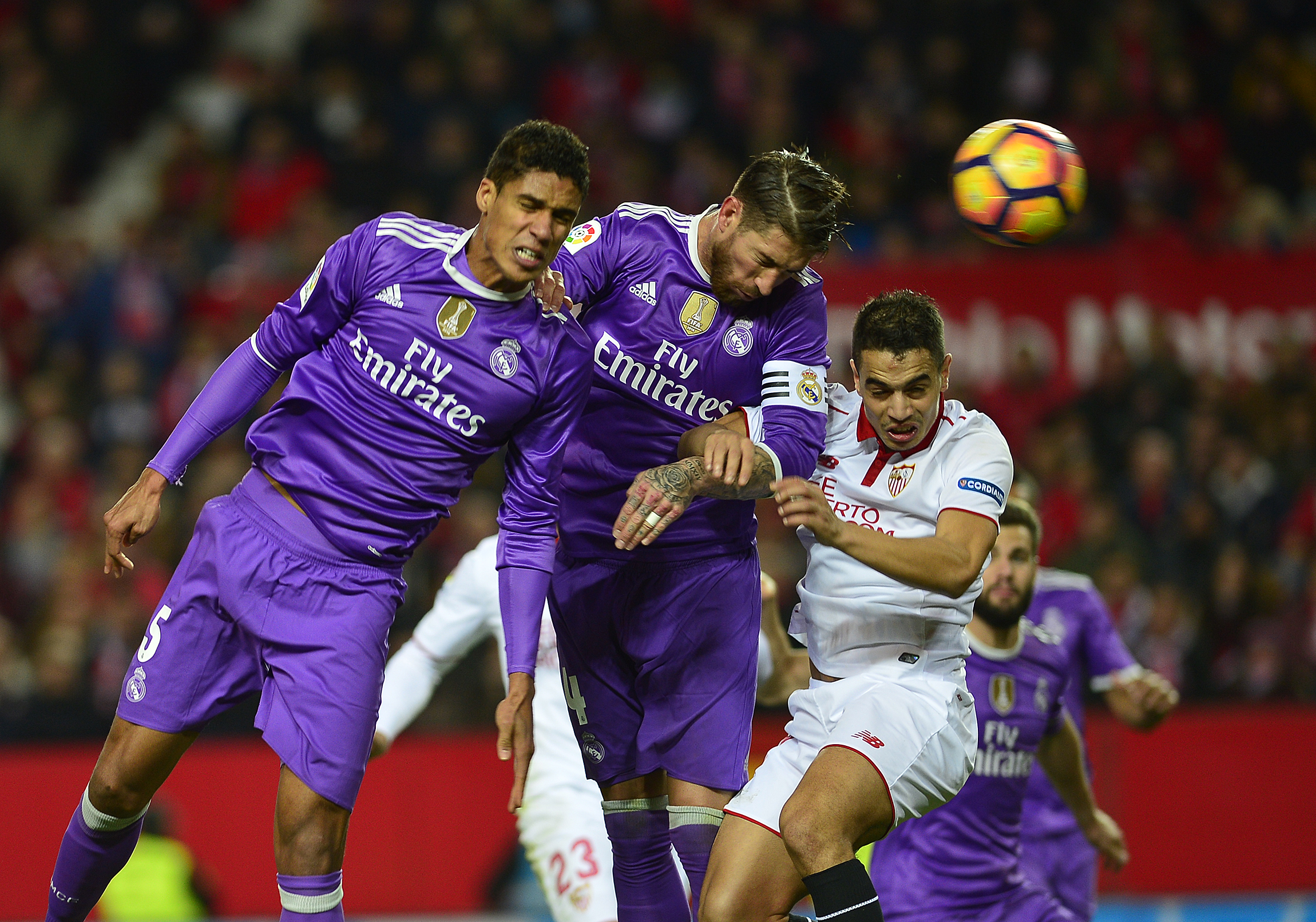 Real Madrid's defender Sergio Ramos (C) scored an own goal during the Spanish league football match Sevilla FC vs Real Madrid CF at the Ramon Sanchez Pizjuan stadium in Sevilla on January 15, 2017.
Sevilla won 2-1. / AFP / CRISTINA QUICLER        (Photo credit should read CRISTINA QUICLER/AFP/Getty Images)