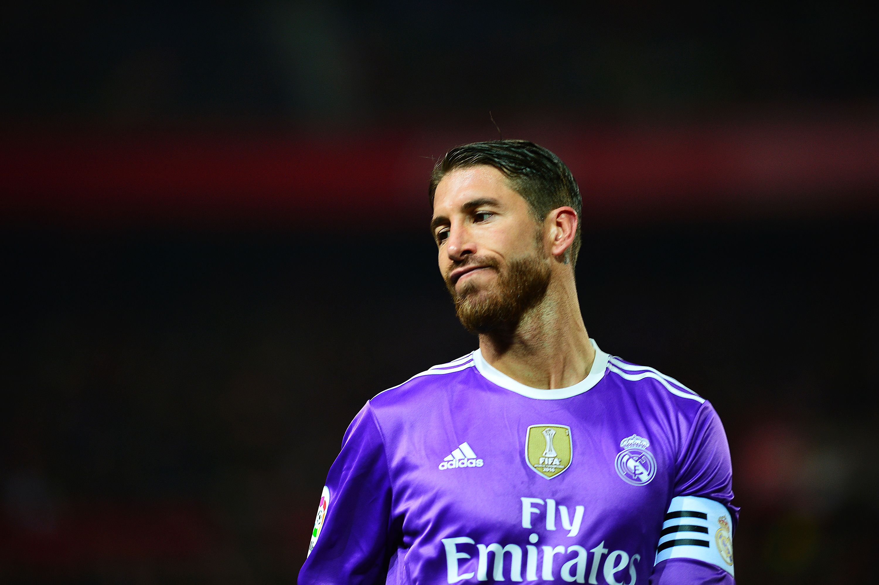 Real Madrid's defender Sergio Ramos grimaces during the Spanish league football match Sevilla FC vs Real Madrid CF at the Ramon Sanchez Pizjuan stadium in Sevilla on January 15, 2017.
Sevilla won 2-1. / AFP / CRISTINA QUICLER        (Photo credit should read CRISTINA QUICLER/AFP/Getty Images)