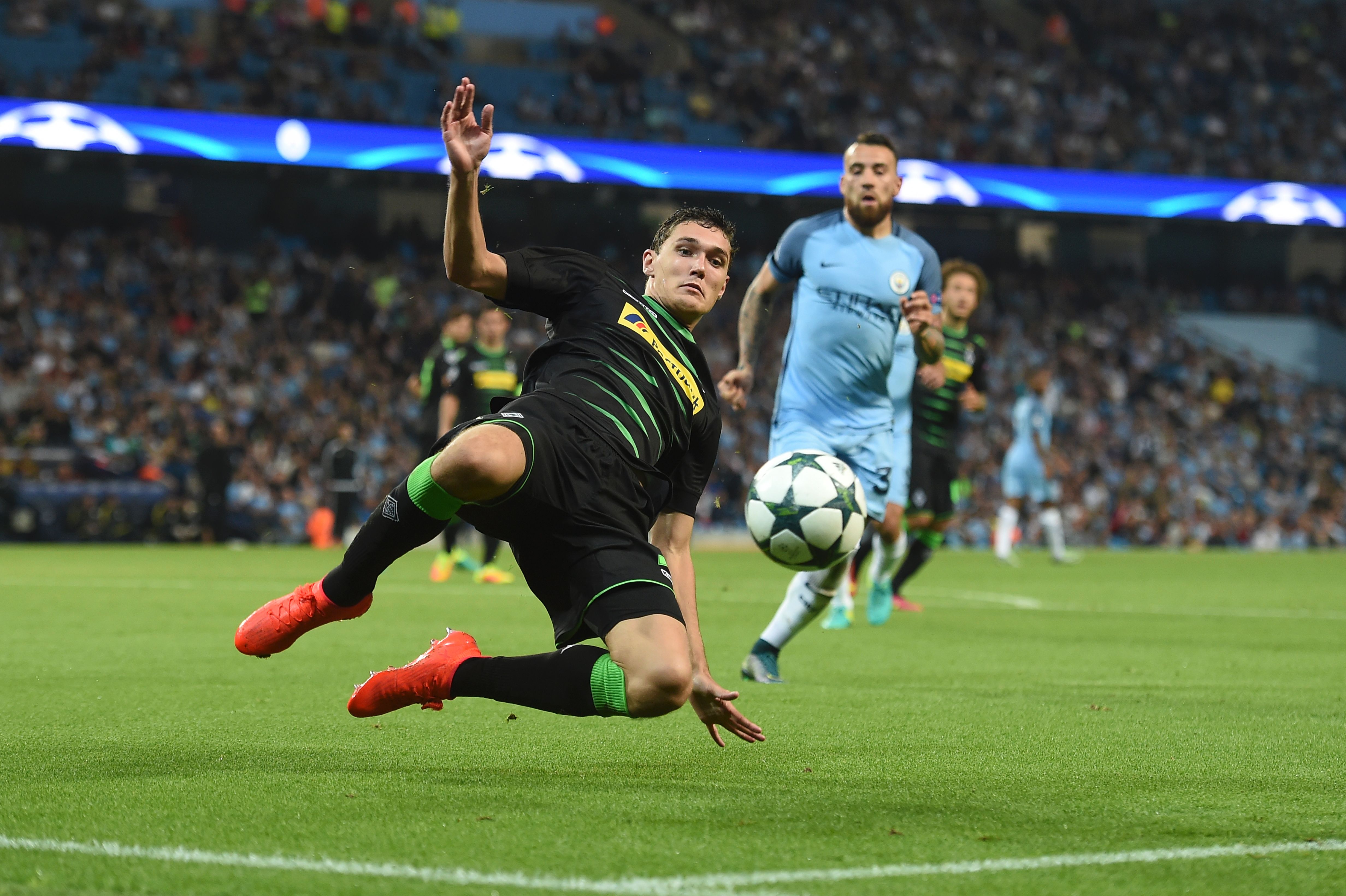 Moenchengladbach's Danish defender Andreas Christensen tries to keep the ball in play during the UEFA Champions League group C football match between Manchester City and Borussia Monchengladbach at the Etihad stadium in Manchester, northwest England, on September 14, 2016. / AFP / PAUL ELLIS        (Photo credit should read PAUL ELLIS/AFP/Getty Images)