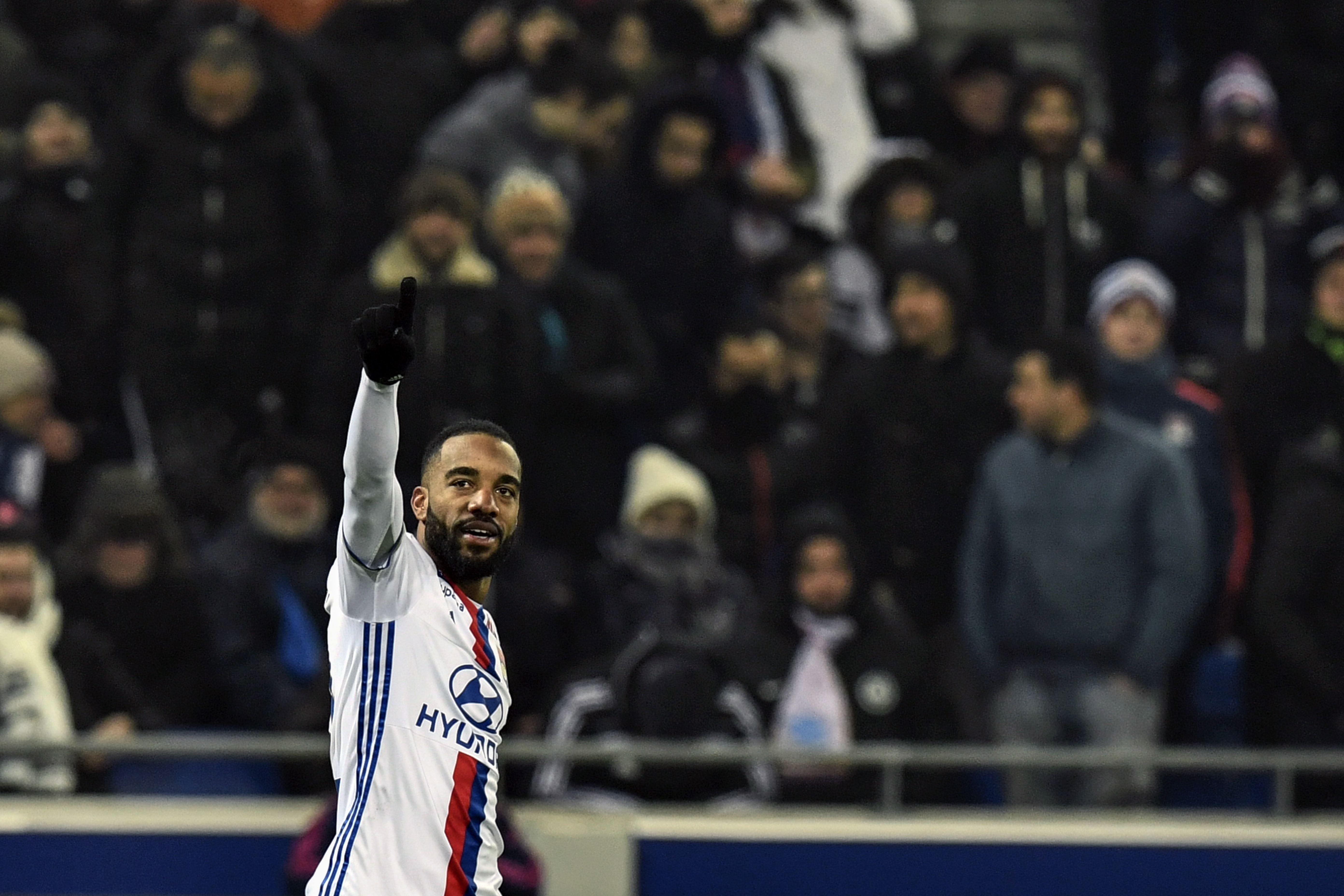 Lyon's French forward Alexandre Lacazette celebrates after scoring a goal during the French L1 football match Olympique Lyonnais (OL) vs Marseille (OM) on January 22, 2017, at the Parc Olympique Lyonnais stadium in Decines-Charpieu, central-eastern France.  / AFP / JEFF PACHOUD        (Photo credit should read JEFF PACHOUD/AFP/Getty Images)