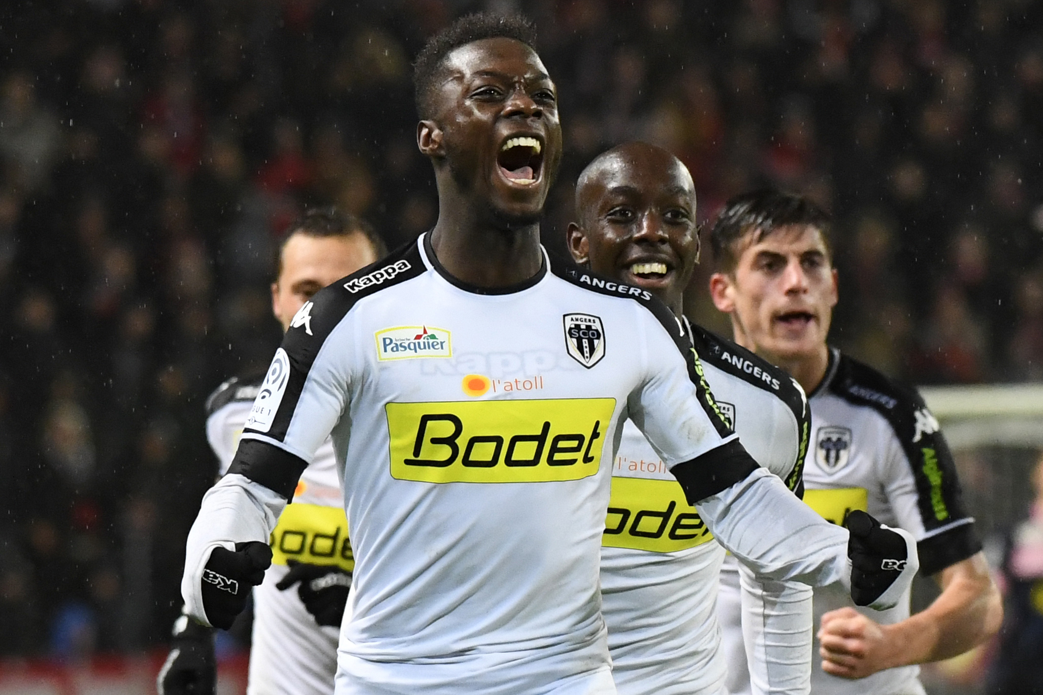 Angers' French forward Nicolas Pepe celebrates after scoring a goal during the French L1 football match between Rennes and Angers at the Roazhon park stadium in Rennes, western France, on November 19, 2016. / AFP / DAMIEN MEYER        (Photo credit should read DAMIEN MEYER/AFP/Getty Images)