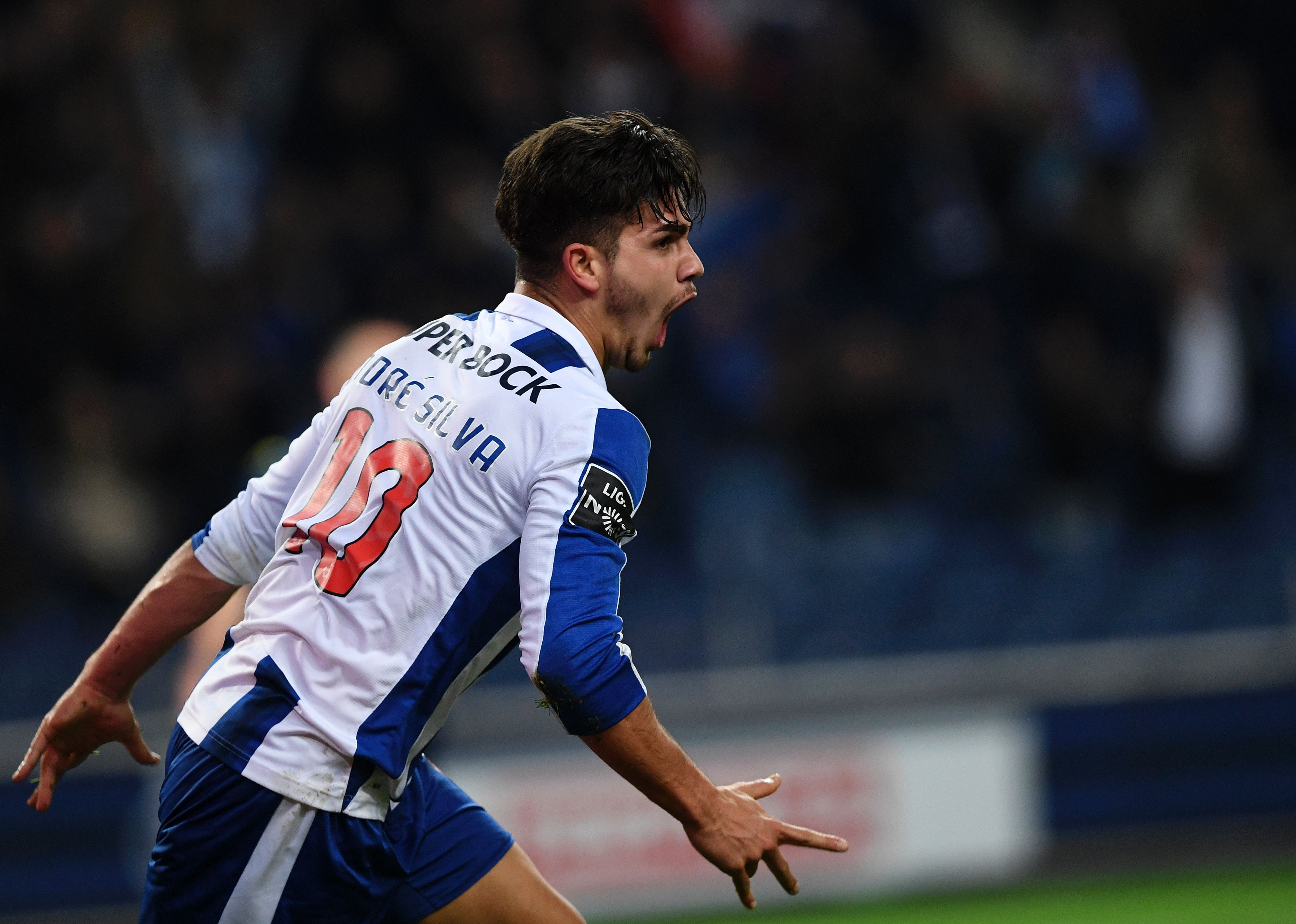 Porto's forward Andre Silva celebrates after scoring during the Portuguese league football match FC Porto vs Moreirense FC at the Dragao stadium in Porto on January 15, 2017. / AFP / FRANCISCO LEONG        (Photo credit should read FRANCISCO LEONG/AFP/Getty Images)