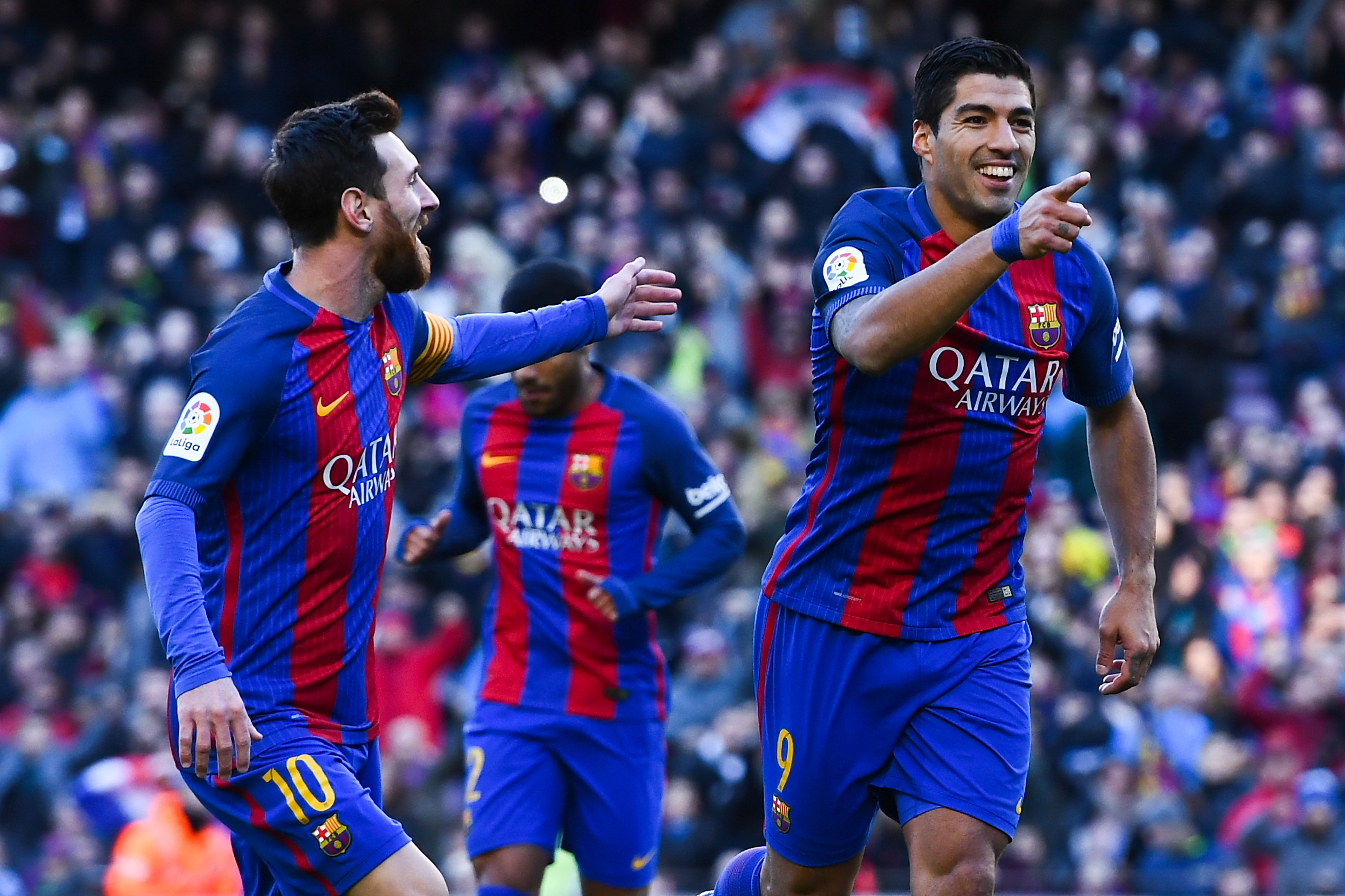 BARCELONA, SPAIN - JANUARY 14:  Luis Suarez of FC Barcelona celebrates with his team mate Lionel Messi after scoring his team's first goal during the La Liga match between FC Barcelona and UD Las Palmas at Camp Nou stadium on January 14, 2017 in Barcelona, Spain.  (Photo by David Ramos/Getty Images)