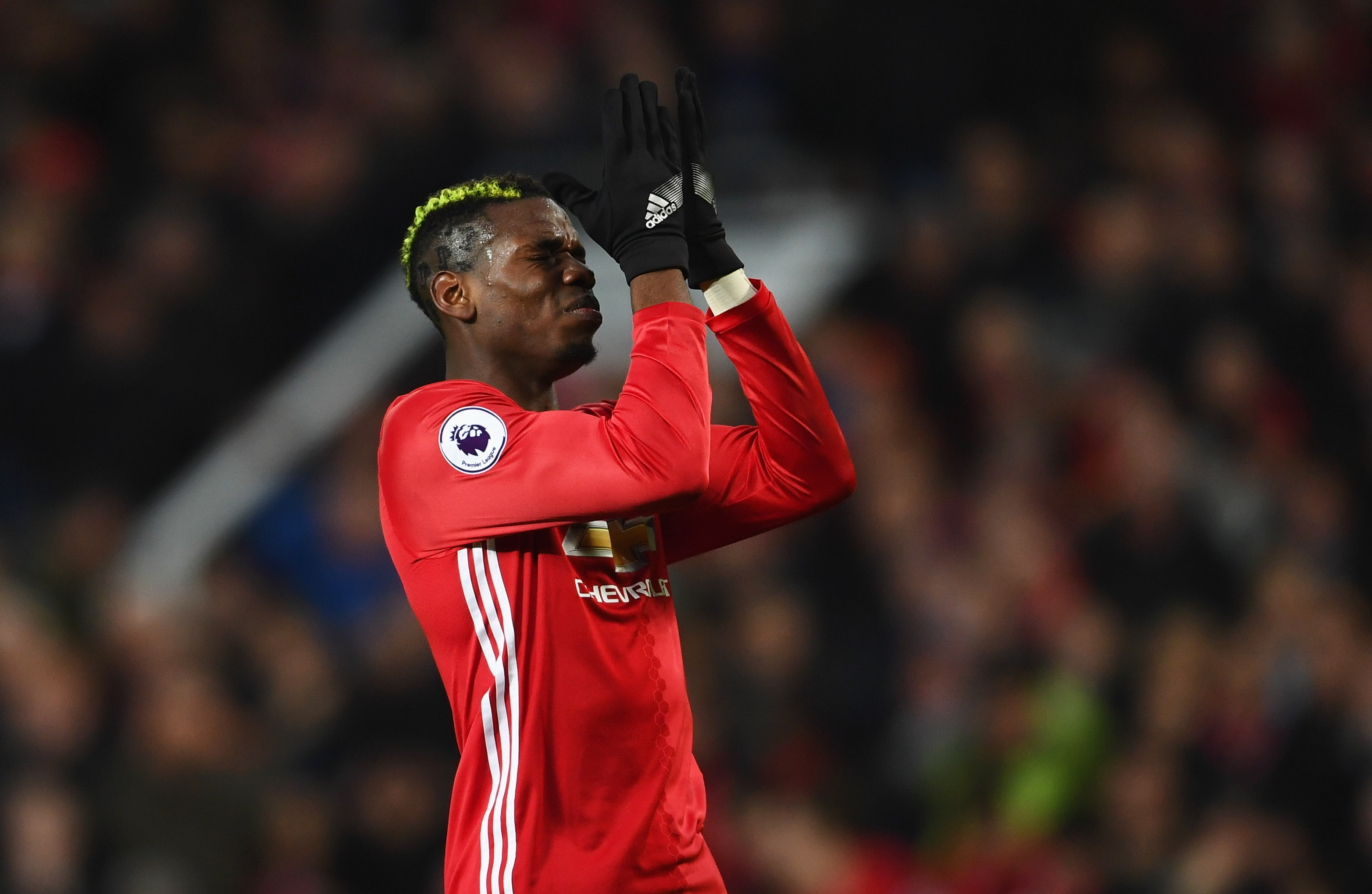 MANCHESTER, ENGLAND - JANUARY 15:  Paul Pogba of Manchester United reacts after a missed chance during the Premier League match between Manchester United and Liverpool at Old Trafford on January 15, 2017 in Manchester, England.  (Photo by Laurence Griffiths/Getty Images)