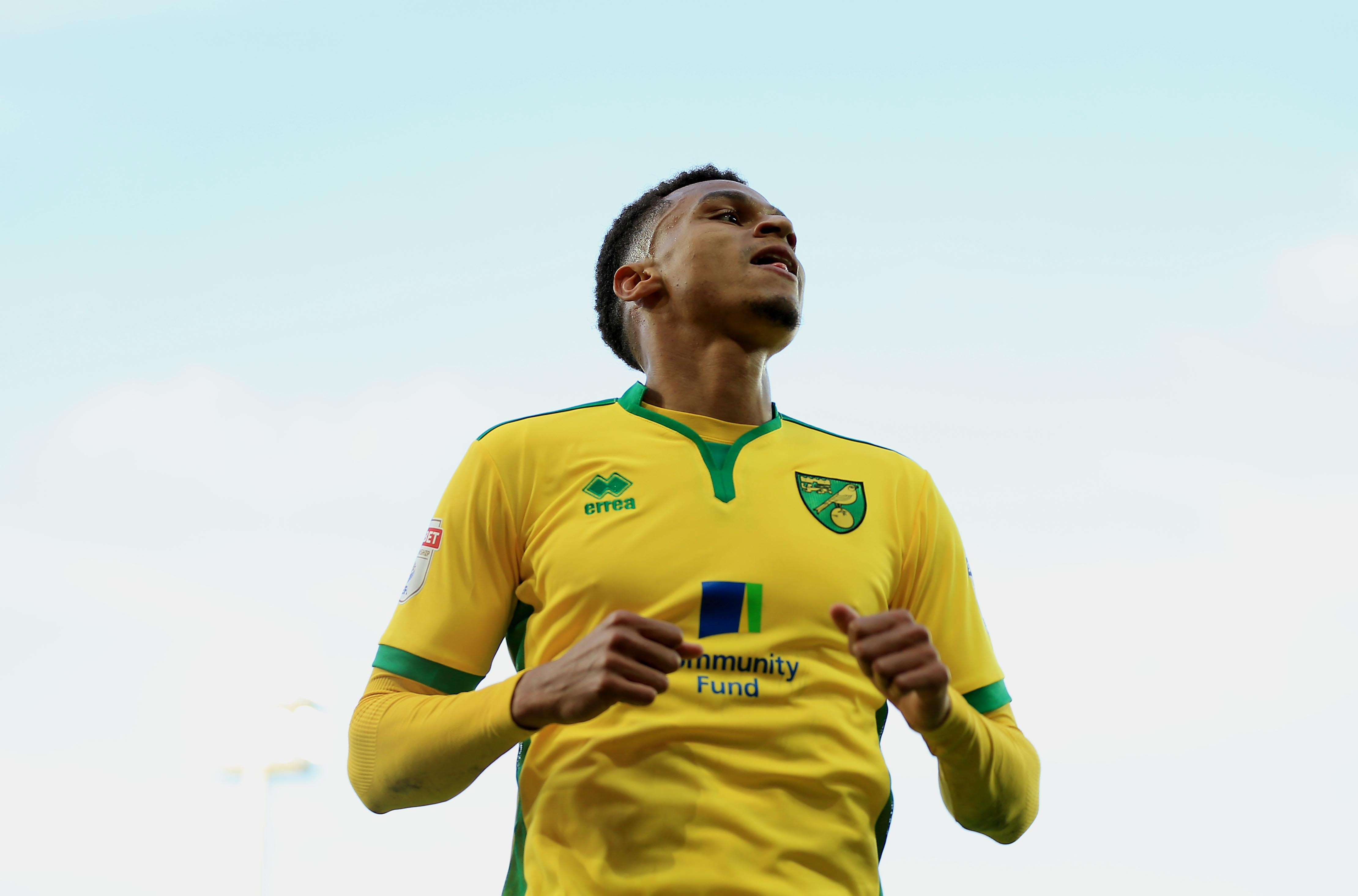 NORWICH, ENGLAND - OCTOBER 15:  Jacob Murphy of Norwich City celebrates after assisting Steven Naismith for their third goal during the Sky Bet Championship match between Norwich City and Rotherham United at Carrow Road on October 15, 2016 in Norwich, England. (Photo by Stephen Pond/Getty Images)