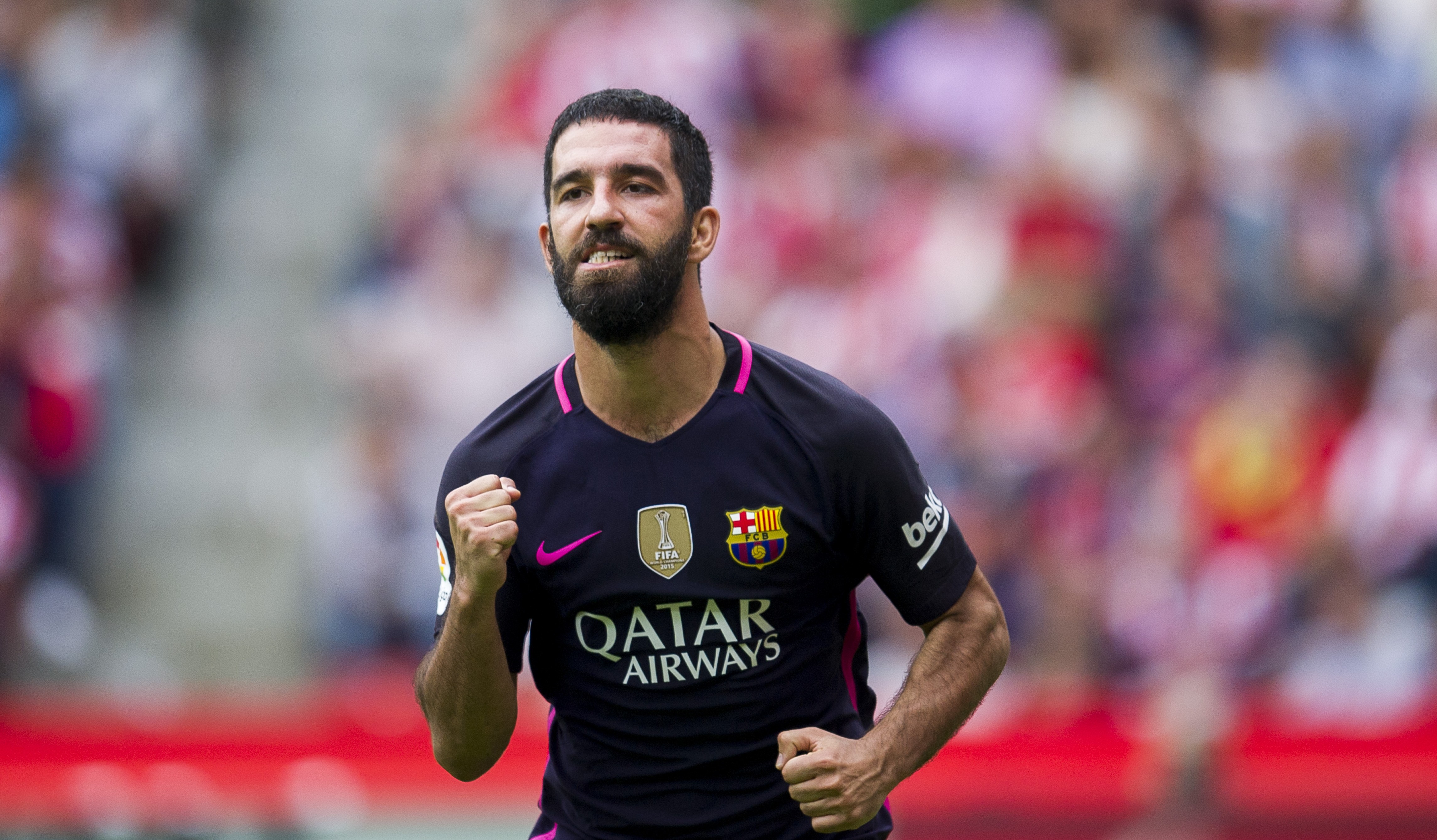 GIJON, SPAIN - SEPTEMBER 24:  Arda Turan of FC Barcelona celebrates after scoring his team's fourth goal during the La Liga match between Real Sporting de Gijon and FC Barcelona at Estadio El Molinon on September 24, 2016 in Gijon, Spain.  (Photo by Juan Manuel Serrano Arce/Getty Images)