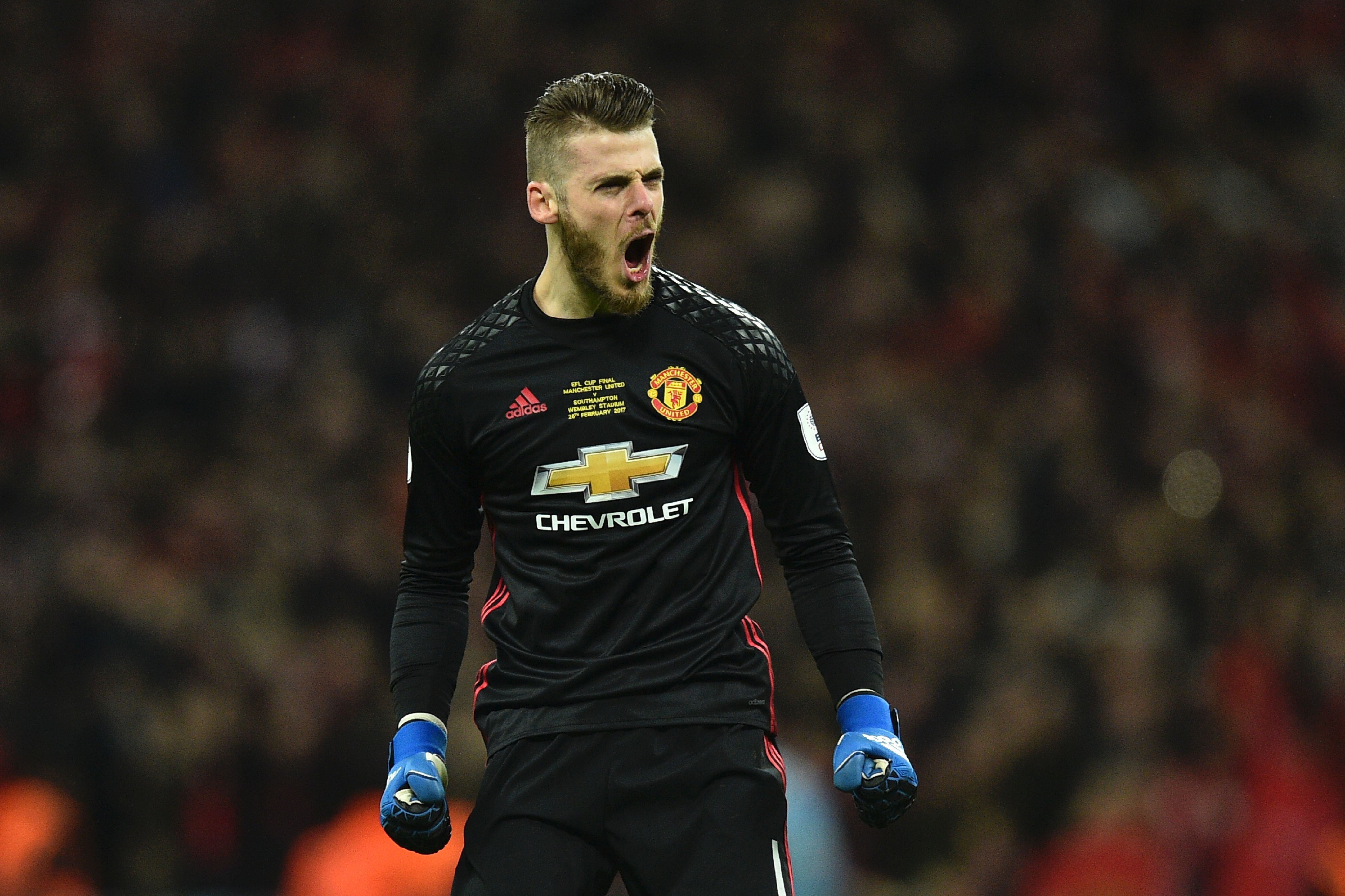 Manchester United's Spanish goalkeeper David de Gea celebrates at the final whistle in the English League Cup final football match between Manchester United and Southampton at Wembley stadium in north London on February 26, 2017.
Manchester United won the game 3-2. / AFP / Glyn KIRK / RESTRICTED TO EDITORIAL USE. No use with unauthorized audio, video, data, fixture lists, club/league logos or 'live' services. Online in-match use limited to 75 images, no video emulation. No use in betting, games or single club/league/player publications.  /         (Photo credit should read GLYN KIRK/AFP/Getty Images)