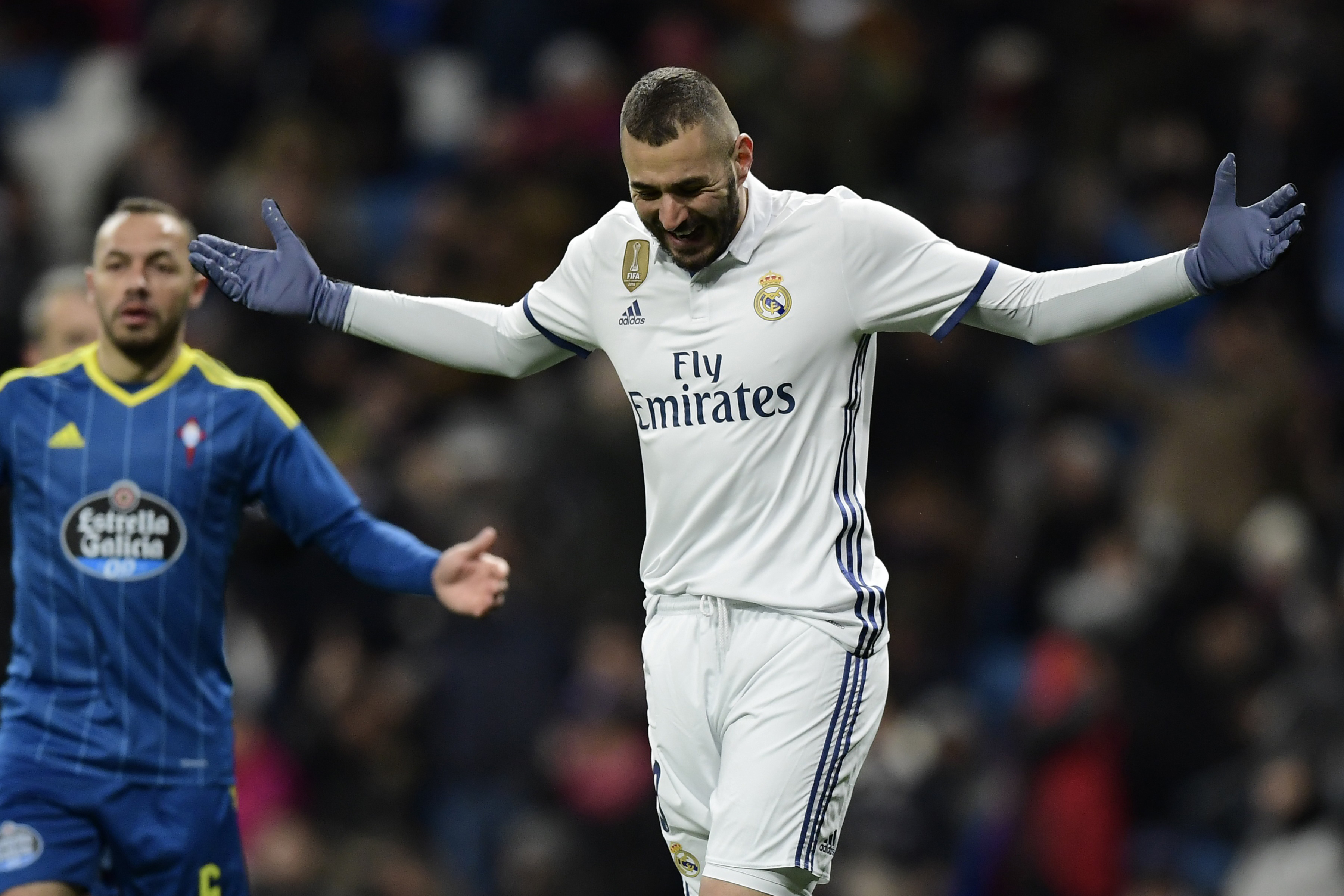 Real Madrid's French forward Karim Benzema gestures after missing a goal opportunity during the Spanish Copa del Rey (King's Cup) quarter-final first leg football match Real Madrid CF vs RC Celta de Vigo at the Santiago Bernabeu stadium in Madrid on January 18, 2017. / AFP / JAVIER SORIANO        (Photo credit should read JAVIER SORIANO/AFP/Getty Images)