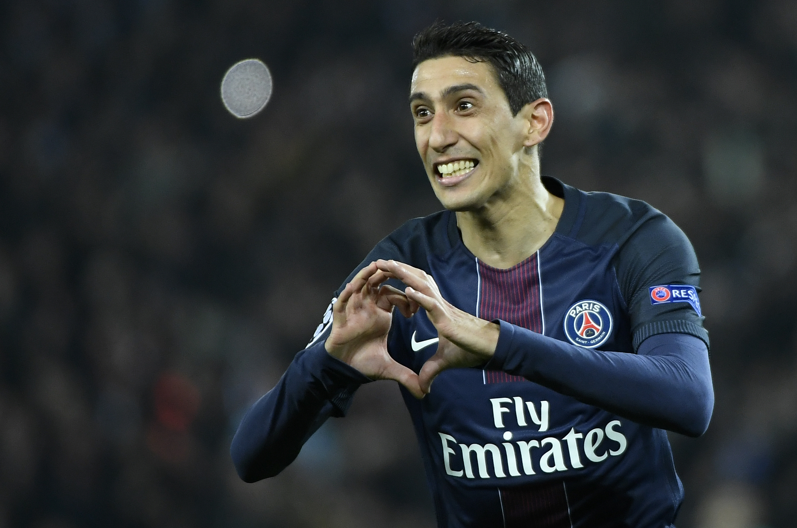 Paris Saint-Germain's Argentinian forward Angel Di Maria celebrates after scoring a goal during the UEFA Champions League round of 16 first leg football match between Paris Saint-Germain and FC Barcelona on February 14, 2017 at the Parc des Princes stadium in Paris. / AFP / Lionel BONAVENTURE        (Photo credit should read LIONEL BONAVENTURE/AFP/Getty Images)