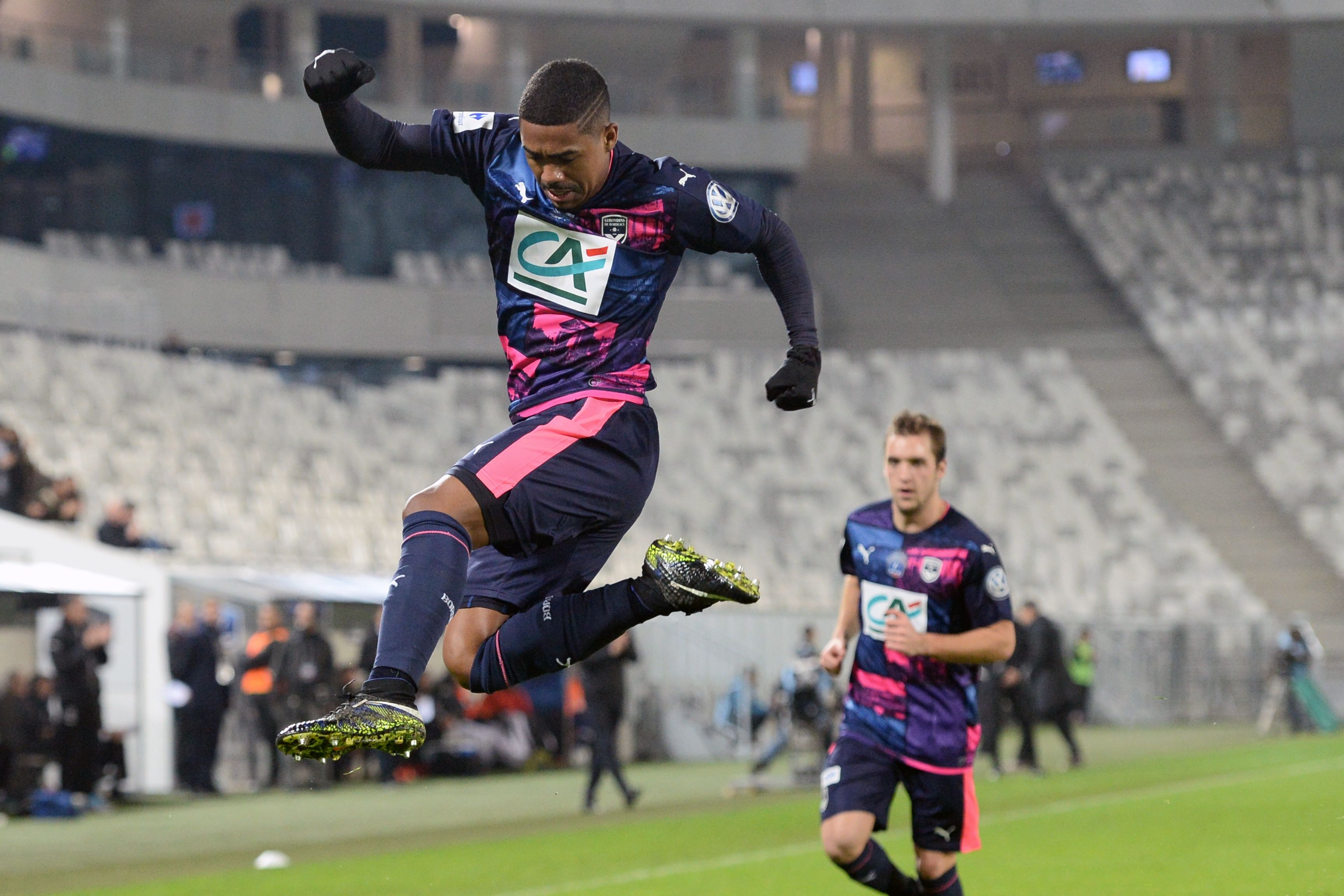 Bordeaux's Brazilian forward Malcom celebrates after scoring a goal during the French Cup football match between Bordeaux (FCGB) and Dijon on January 31, 2017 at the Matmut Atlantique stadium in Bordeaux, southwestern France. / AFP / NICOLAS TUCAT        (Photo credit should read NICOLAS TUCAT/AFP/Getty Images)