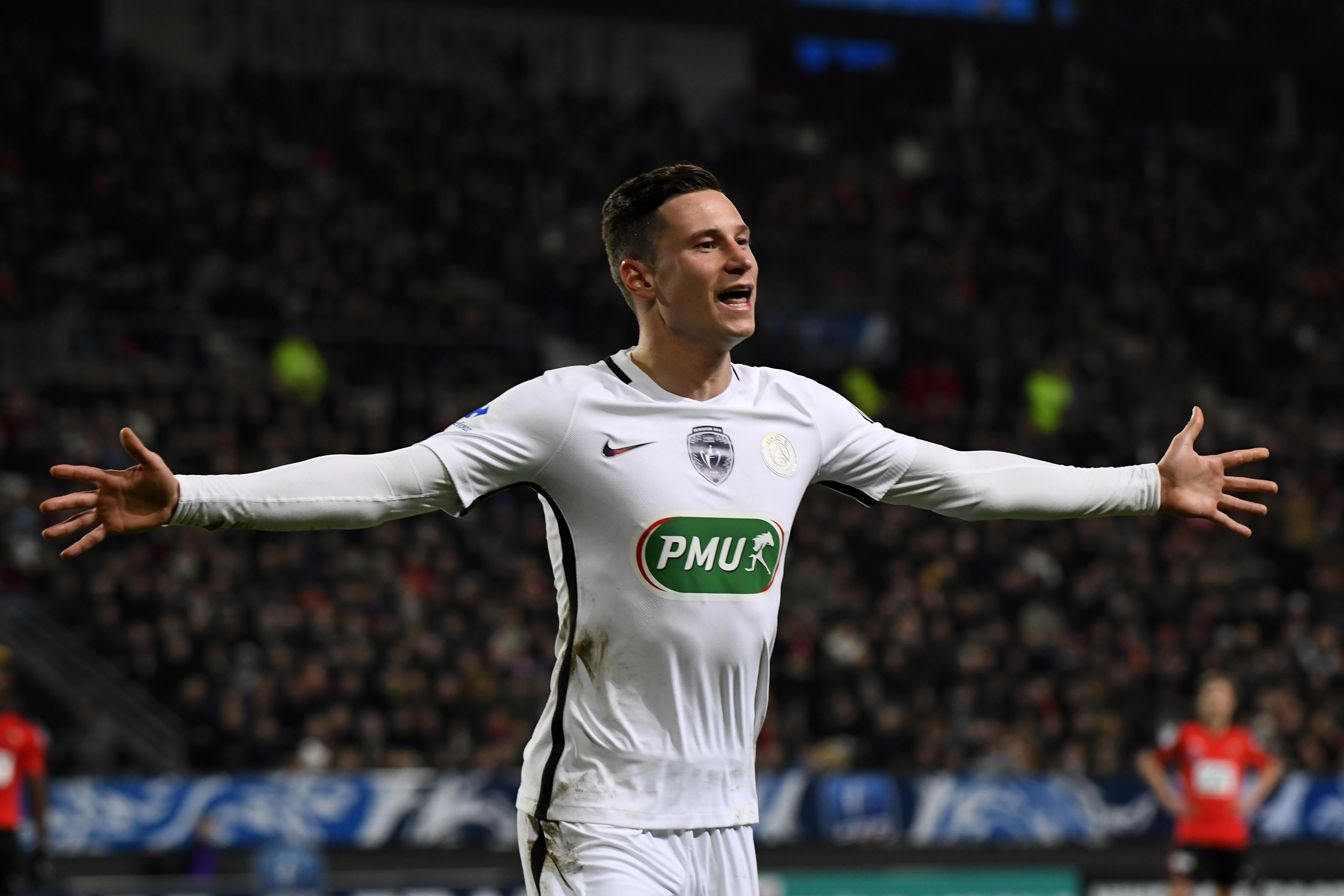 Paris Saint-Germain's German forward Julian Draxler celebrates after scoring a goal during the French Cup football match Rennes against Paris Saint Germain on February 1, 2017 at the Roahzon Park stadium in Rennes, western France. / AFP / DAMIEN MEYER        (Photo credit should read DAMIEN MEYER/AFP/Getty Images)