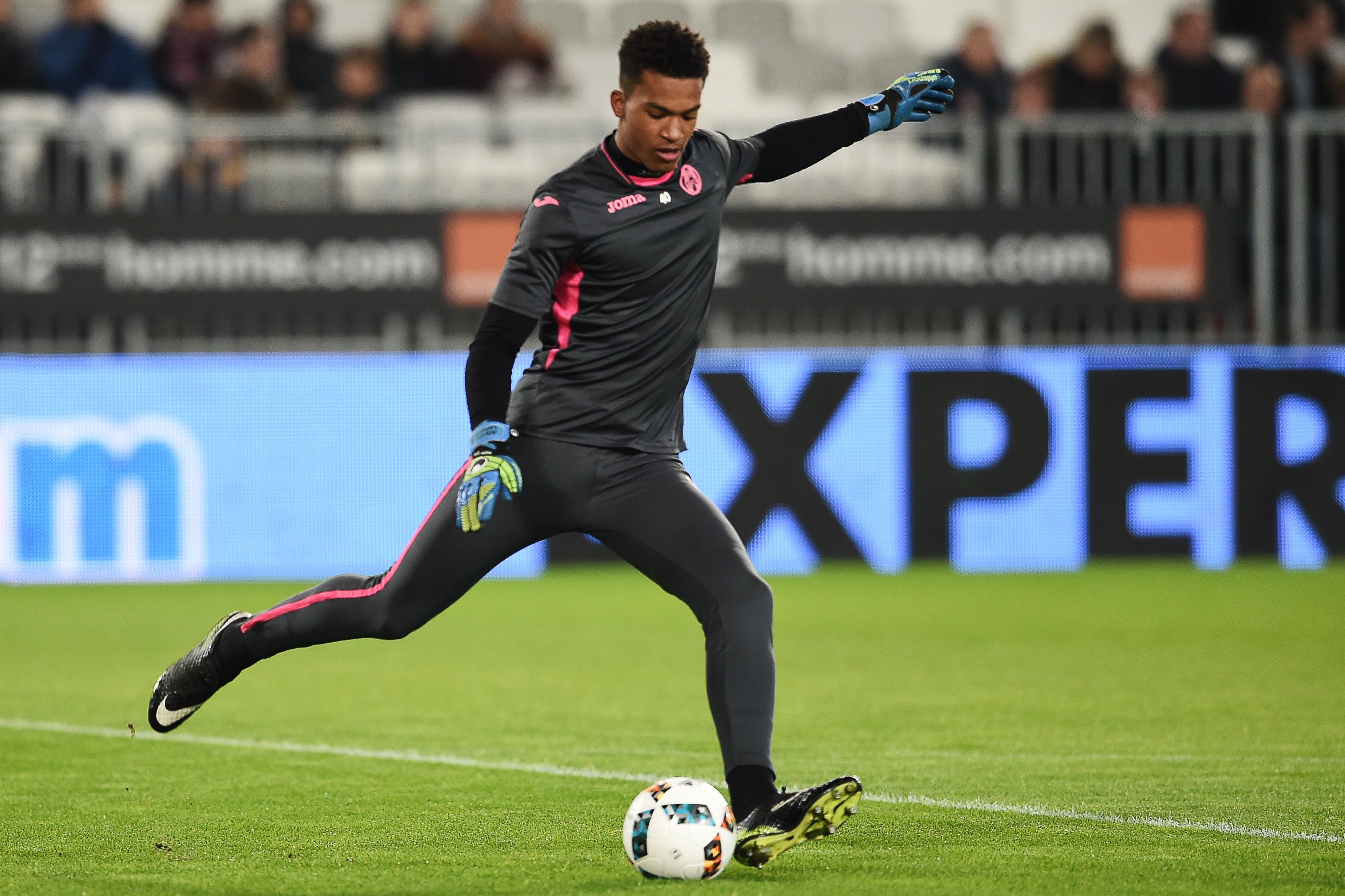Toulouse's French goalkeeper Alban Lafont kicks the ball during warm up prior to the French L1 football match Dijon (DFCO) vs Lille (LOSC) on January 21, 2017, at the Gaston-Gerard Stadium in Dijon, central France. / AFP / NICOLAS TUCAT        (Photo credit should read NICOLAS TUCAT/AFP/Getty Images)