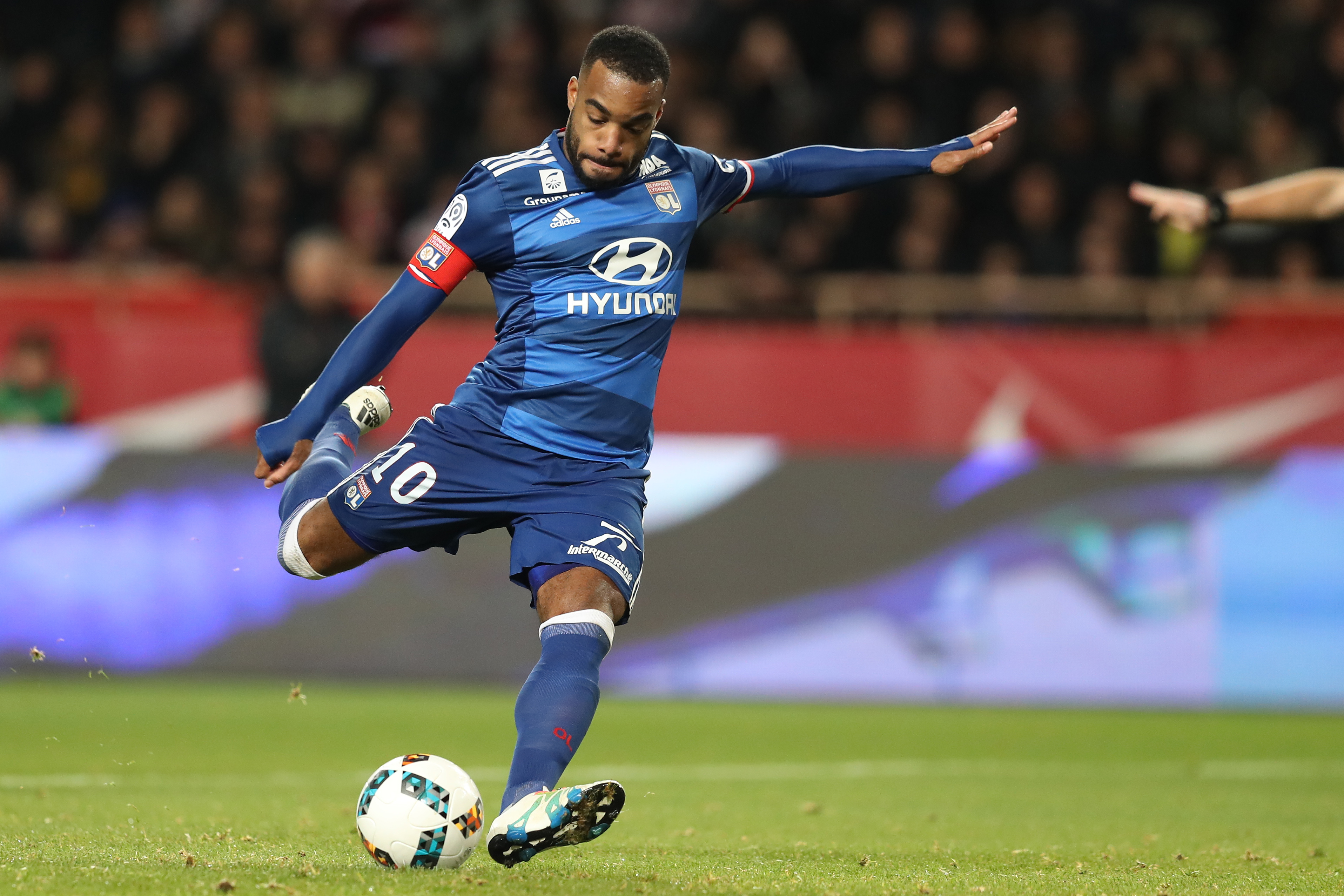 Lyon's French forward Alexandre Lacazette takes a penalty kick which he missed during the French L1 football match between AS Monaco and Lyon at the Louis II Stadium in Monaco on December 18, 2016. / AFP / VALERY HACHE        (Photo credit should read VALERY HACHE/AFP/Getty Images)