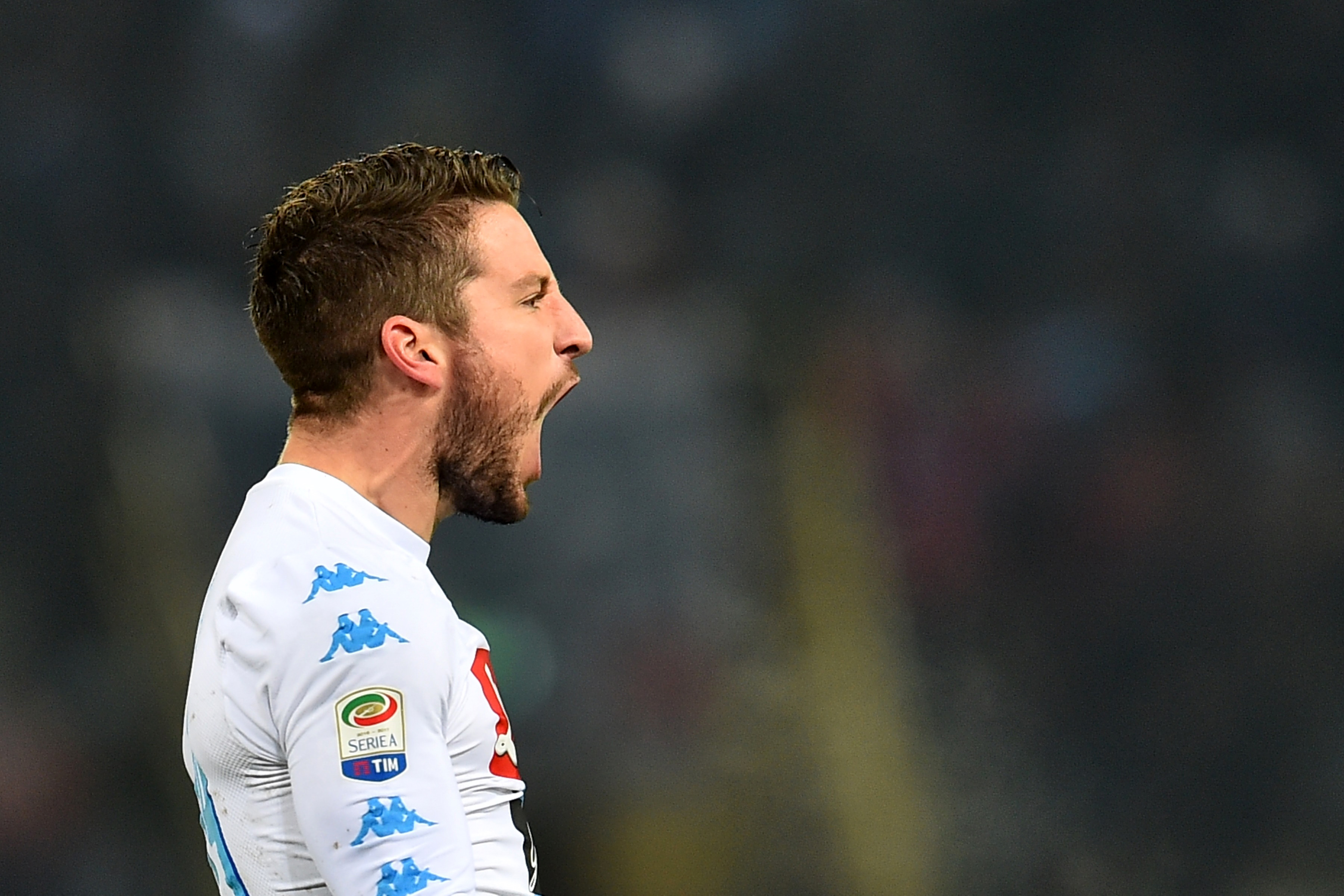 Napoli's forward from Belgium Dries Mertens celebrates after scoring during the Italian Serie A football match Bologna vs Napoli at "Renato Dall'Ara Stadium" in Bologna on February 4, 2017.  / AFP / GIUSEPPE CACACE        (Photo credit should read GIUSEPPE CACACE/AFP/Getty Images)