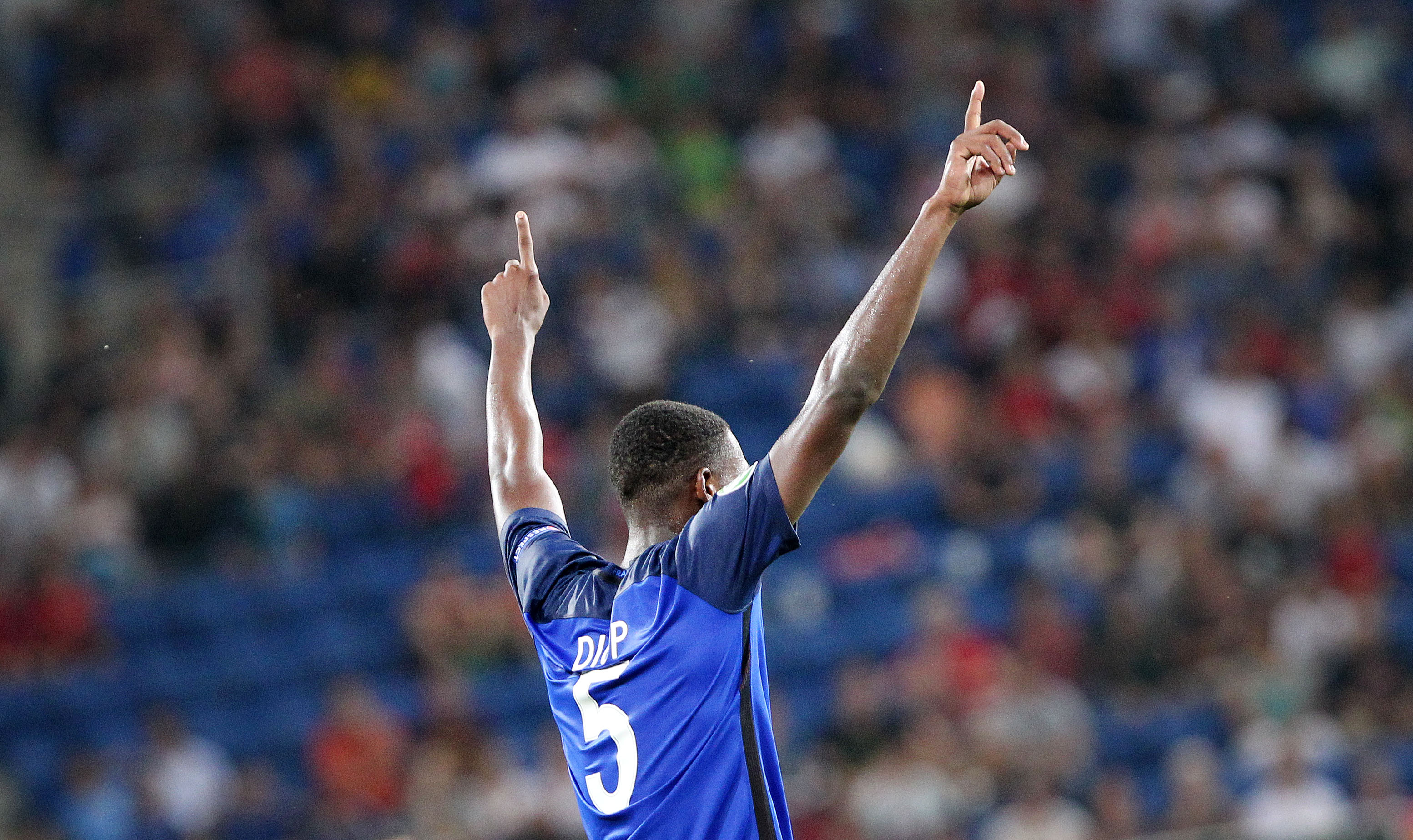 France's Issa Diop celebrates scoring the 4-0 during the Under 19 Football European Championships final match France vs Italy in Sinsheim, southern Germany, on July 24, 2016. / AFP / DANIEL ROLAND        (Photo credit should read DANIEL ROLAND/AFP/Getty Images)