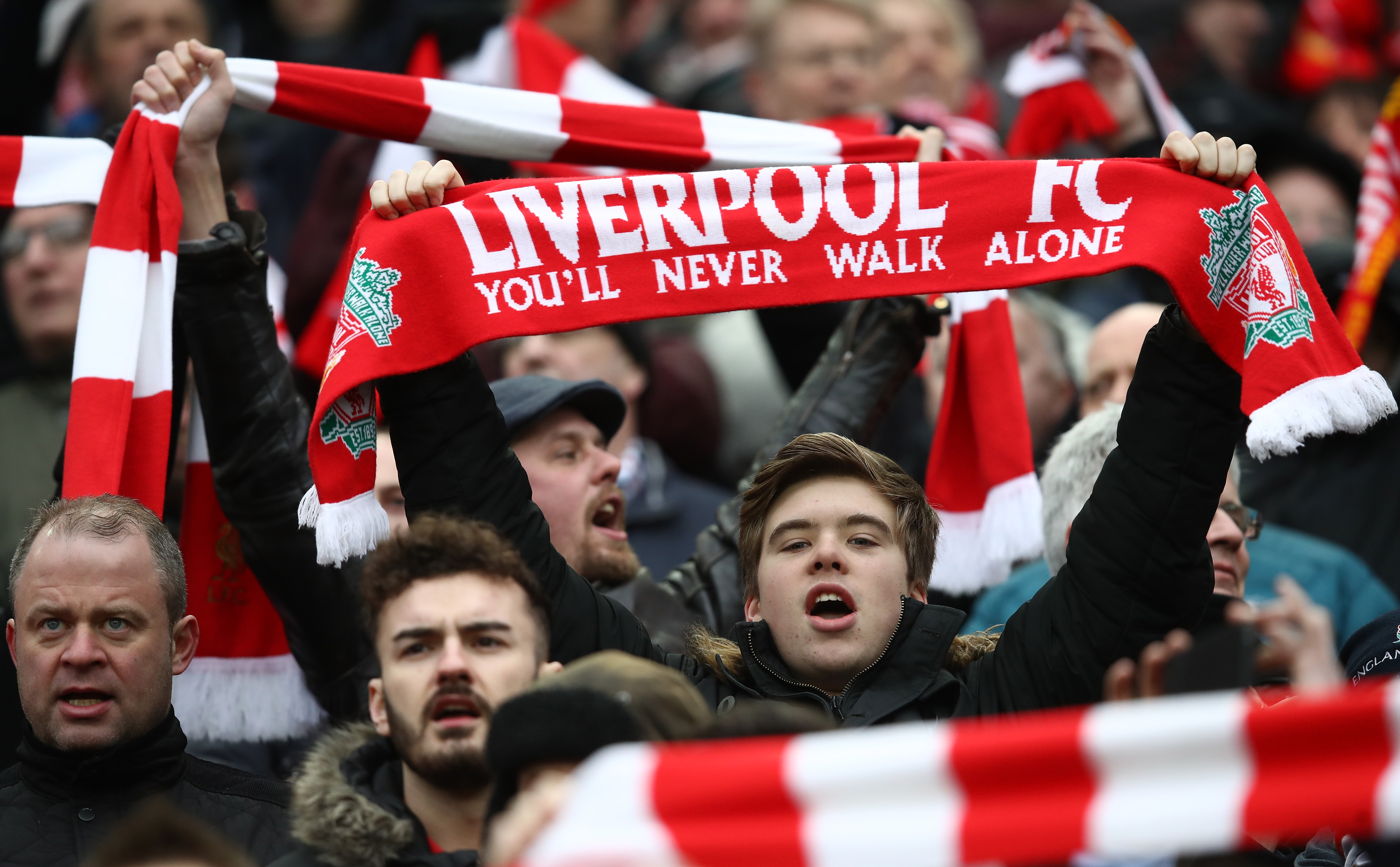 LIVERPOOL, ENGLAND - JANUARY 21: Liverpool fans are seen outside the stadium prior to the Premier League match between Liverpool and Swansea City at Anfield on January 21, 2017 in Liverpool, England.  (Photo by Julian Finney/Getty Images)