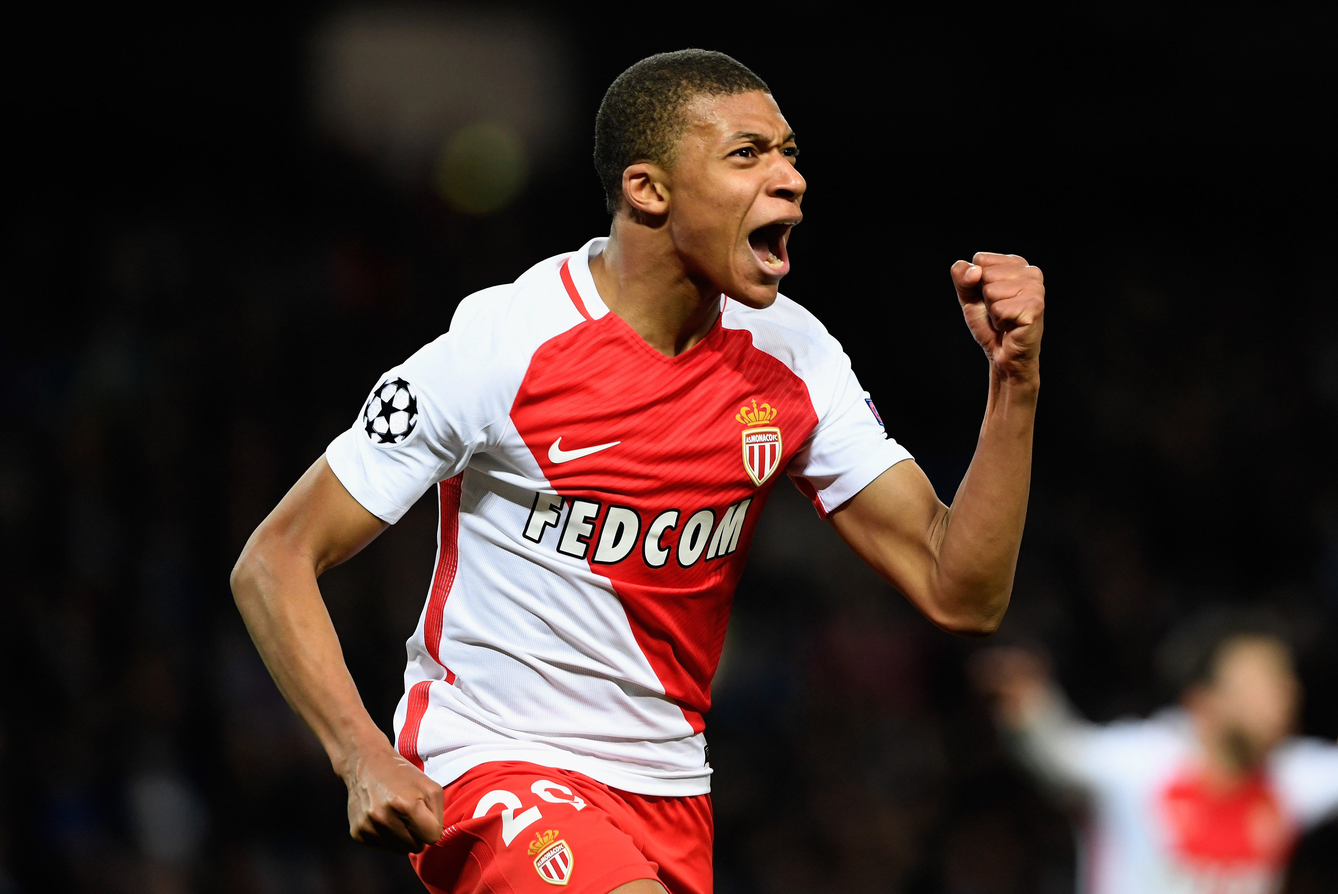 MANCHESTER, ENGLAND - FEBRUARY 21:  Kylian Mbappe of AS Monaco celebrates as he scores their second goal during the UEFA Champions League Round of 16 first leg match between Manchester City FC and AS Monaco at Etihad Stadium on February 21, 2017 in Manchester, United Kingdom.  (Photo by Stu Forster/Getty Images)