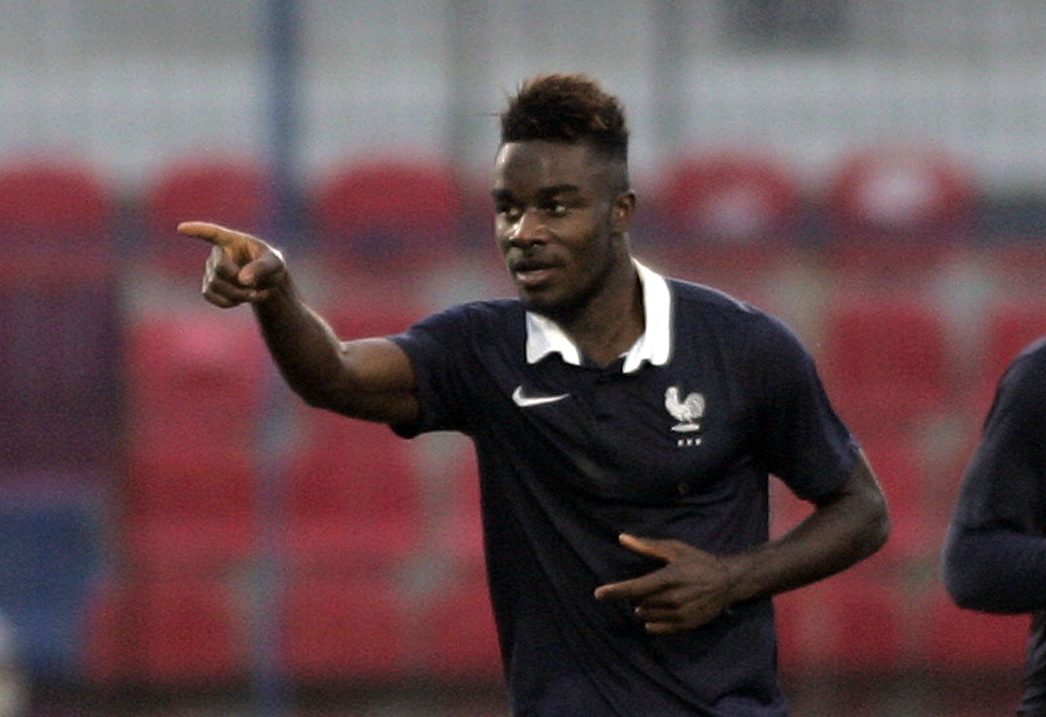 VERIA, GREECE - NOVEMBER 17: Maxwel Gnaly Cornet   of  France geaticulate after scoring a goal during the UEFA U-19 Friendly Tournament match between  France vs Germany at  Stadium Veria  on  November 17, 2014 in Veria, Greece  (Photo by Milos Bicanski/Getty Images) *** Local Caption***