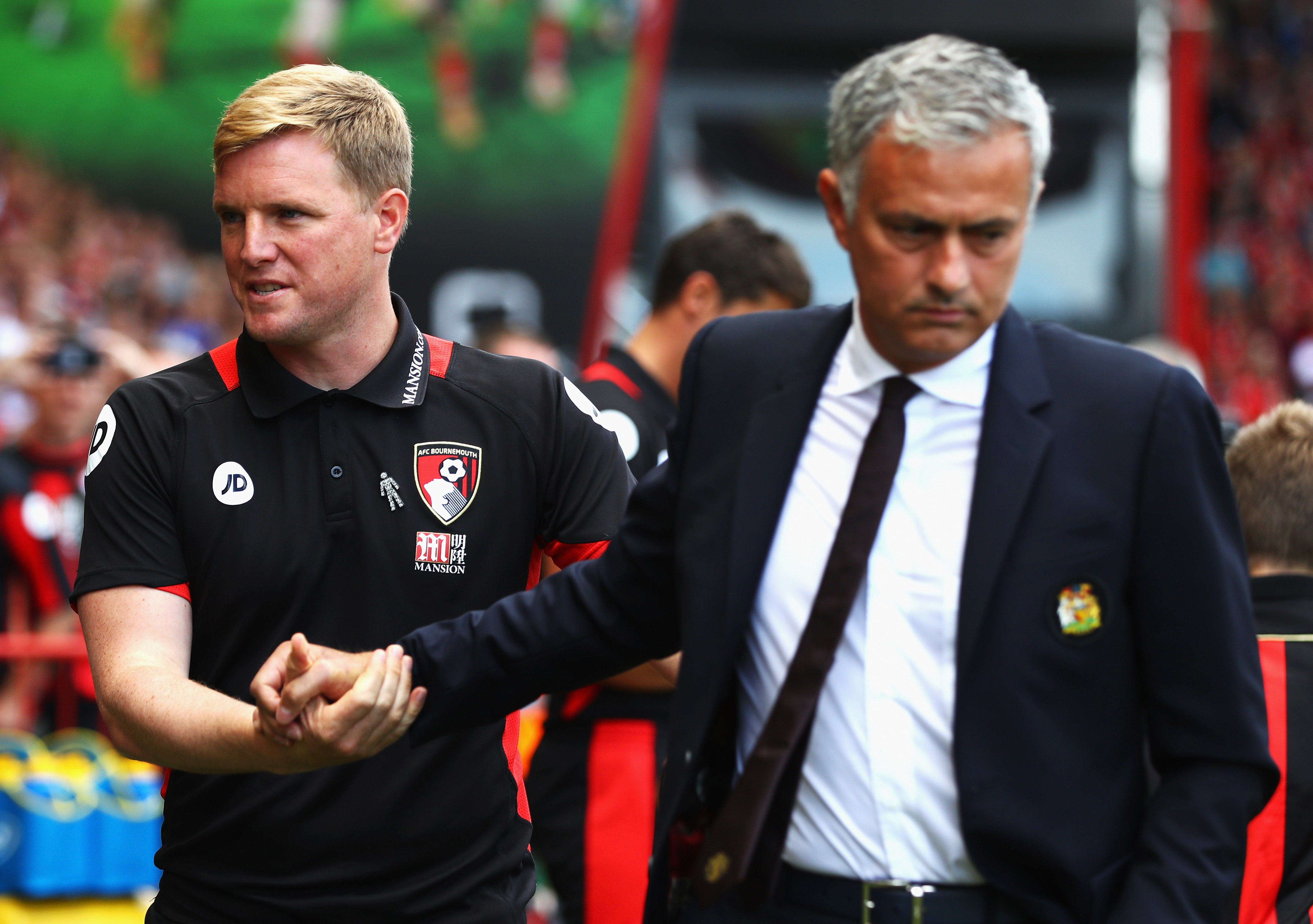 BOURNEMOUTH, ENGLAND - AUGUST 14: Eddie Howe, Manager of AFC Bournemouth greets manager of Manchester United, Jose Mourinho during the Premier League match between AFC Bournemouth and Manchester United at Vitality Stadium on August 14, 2016 in Bournemouth, England.  (Photo by Michael Steele/Getty Images)
