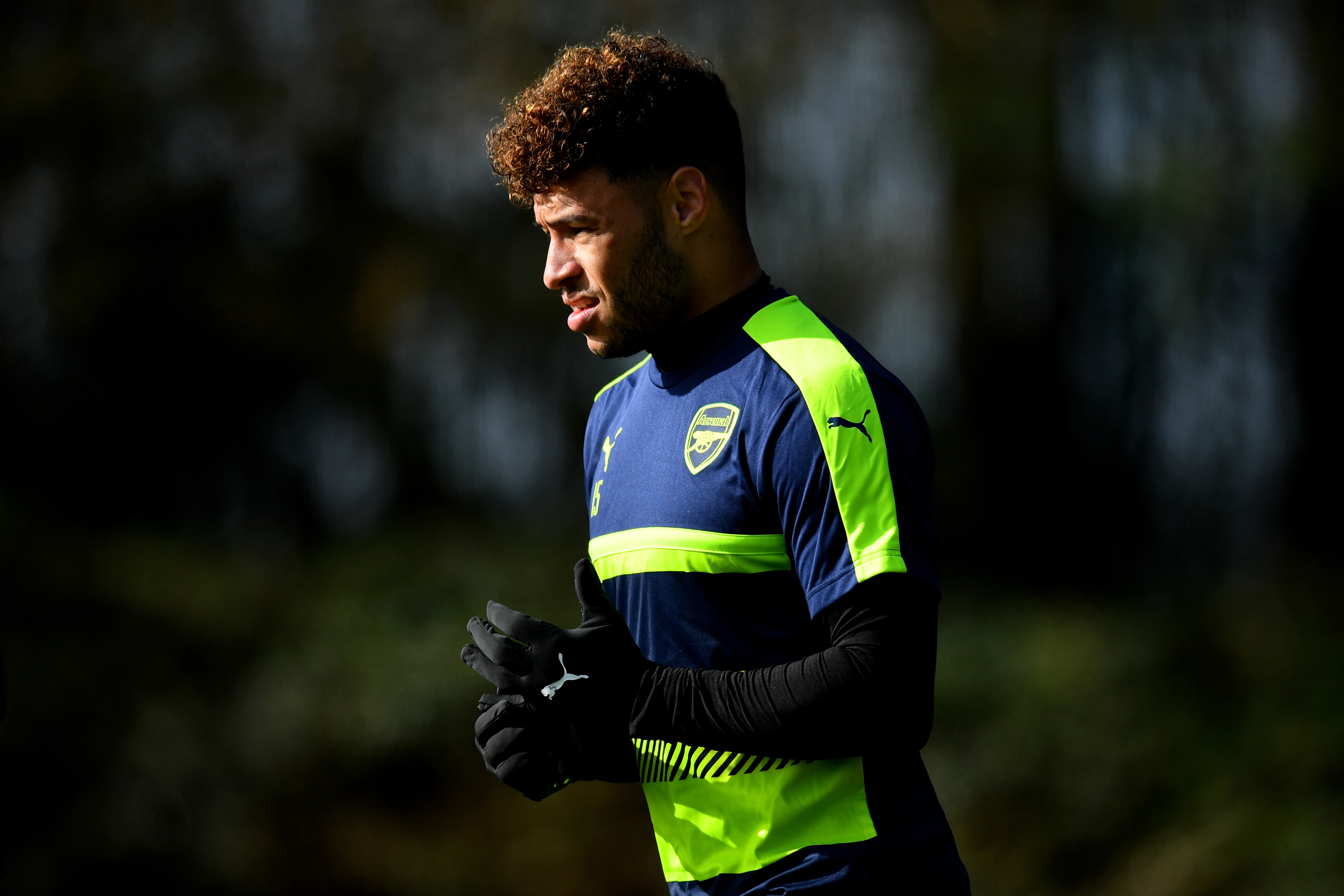 ST ALBANS, ENGLAND - MARCH 06: Alex Oxlade Chamberlain arrives prior to the Arsenal traing session at London Colney on March 6, 2017 in St Albans, England.  (Photo by Dan Mullan/Getty Images)