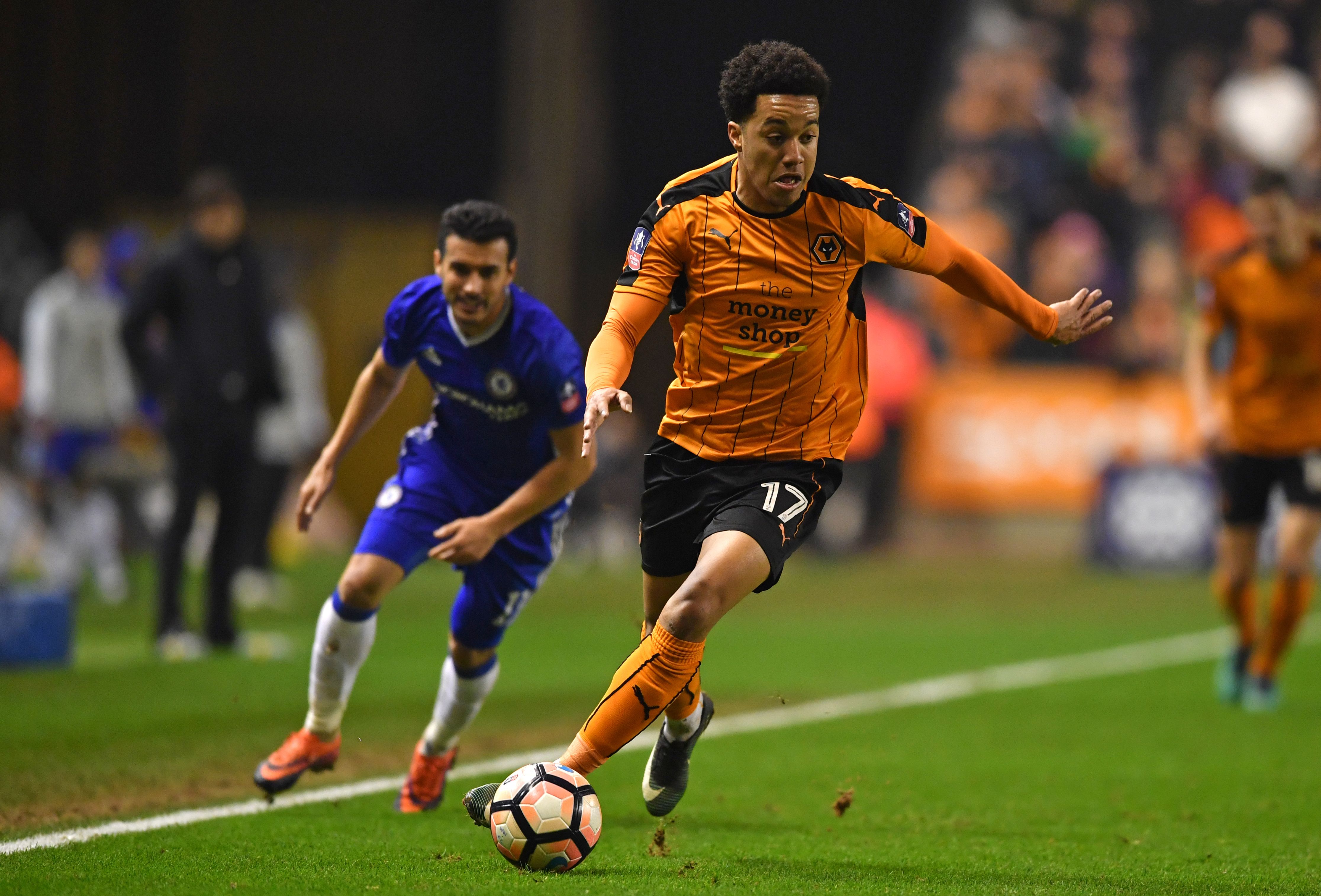 Wolverhampton Wanderers' Portuguese striker Helder Costa runs with the ball during the English FA Cup fifth round football match between Wolverhampton Wanderers and Chelsea at the Molineux stadium in Wolverhampton, central England on February 18, 2017. / AFP / Ben STANSALL / RESTRICTED TO EDITORIAL USE. No use with unauthorized audio, video, data, fixture lists, club/league logos or 'live' services. Online in-match use limited to 75 images, no video emulation. No use in betting, games or single club/league/player publications.  /         (Photo credit should read BEN STANSALL/AFP/Getty Images)