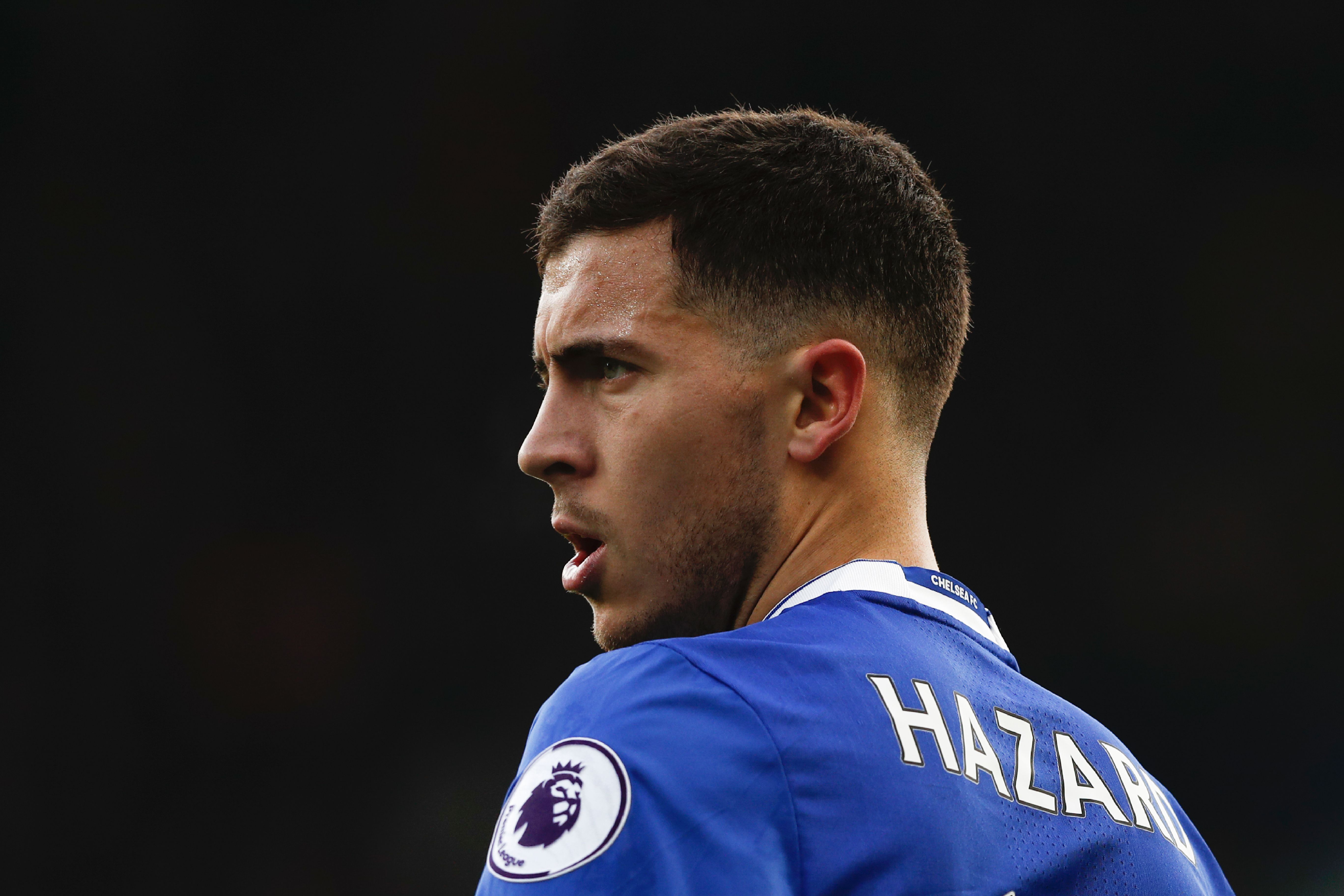 Chelsea's Belgian midfielder Eden Hazard plays during the English Premier League football match between Chelsea and Arsenal at Stamford Bridge in London on February 4, 2017. / AFP / Adrian DENNIS / RESTRICTED TO EDITORIAL USE. No use with unauthorized audio, video, data, fixture lists, club/league logos or 'live' services. Online in-match use limited to 75 images, no video emulation. No use in betting, games or single club/league/player publications.  /         (Photo credit should read ADRIAN DENNIS/AFP/Getty Images)