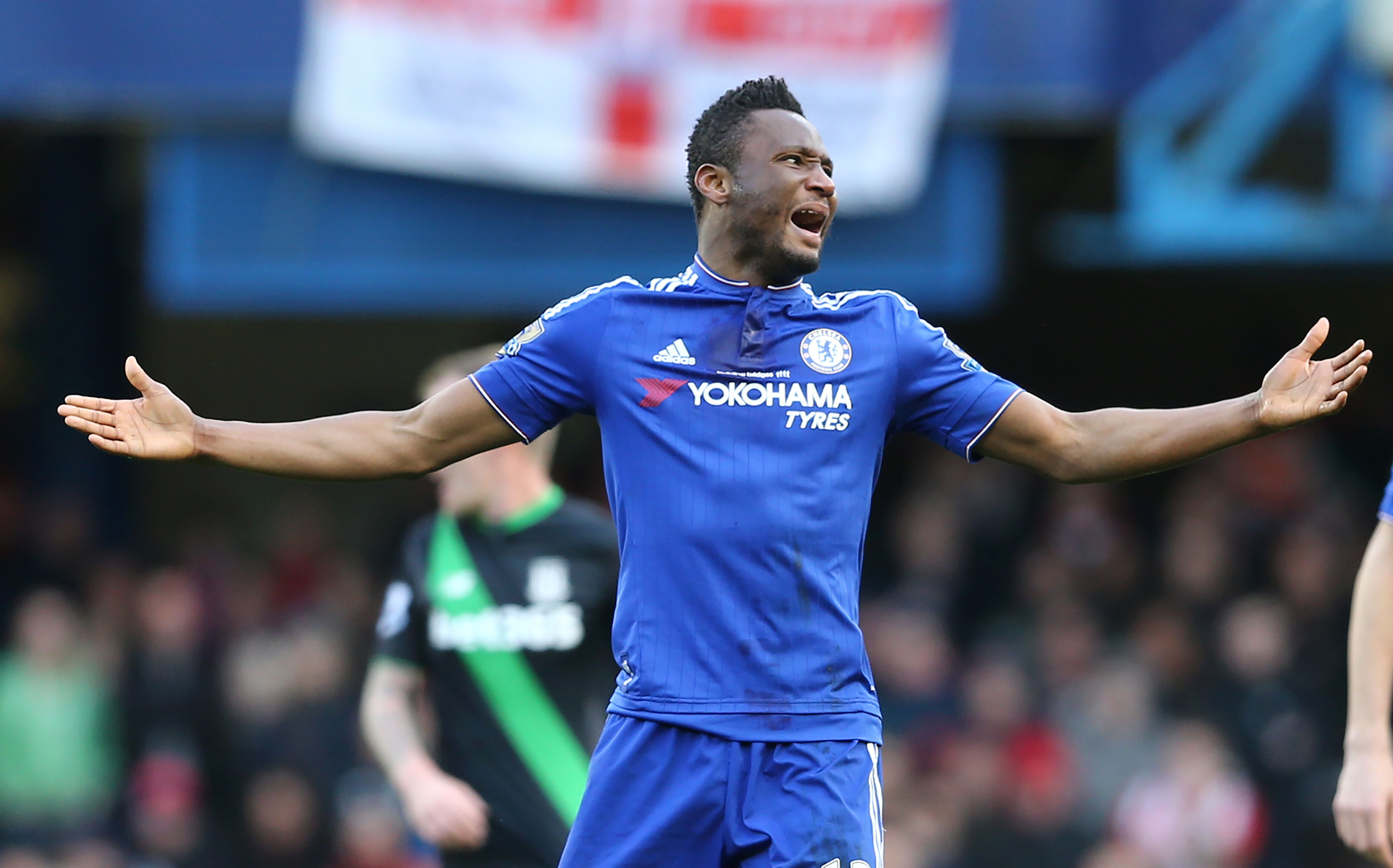 Chelsea's Nigerian midfielder John Obi Mikel reacts as the referee awards a freekick during the English Premier League football match between Chelsea and Stoke City at Stamford Bridge in London on March 5, 2016. / AFP / JUSTIN TALLIS / RESTRICTED TO EDITORIAL USE. No use with unauthorized audio, video, data, fixture lists, club/league logos or 'live' services. Online in-match use limited to 75 images, no video emulation. No use in betting, games or single club/league/player publications.  /         (Photo credit should read JUSTIN TALLIS/AFP/Getty Images)