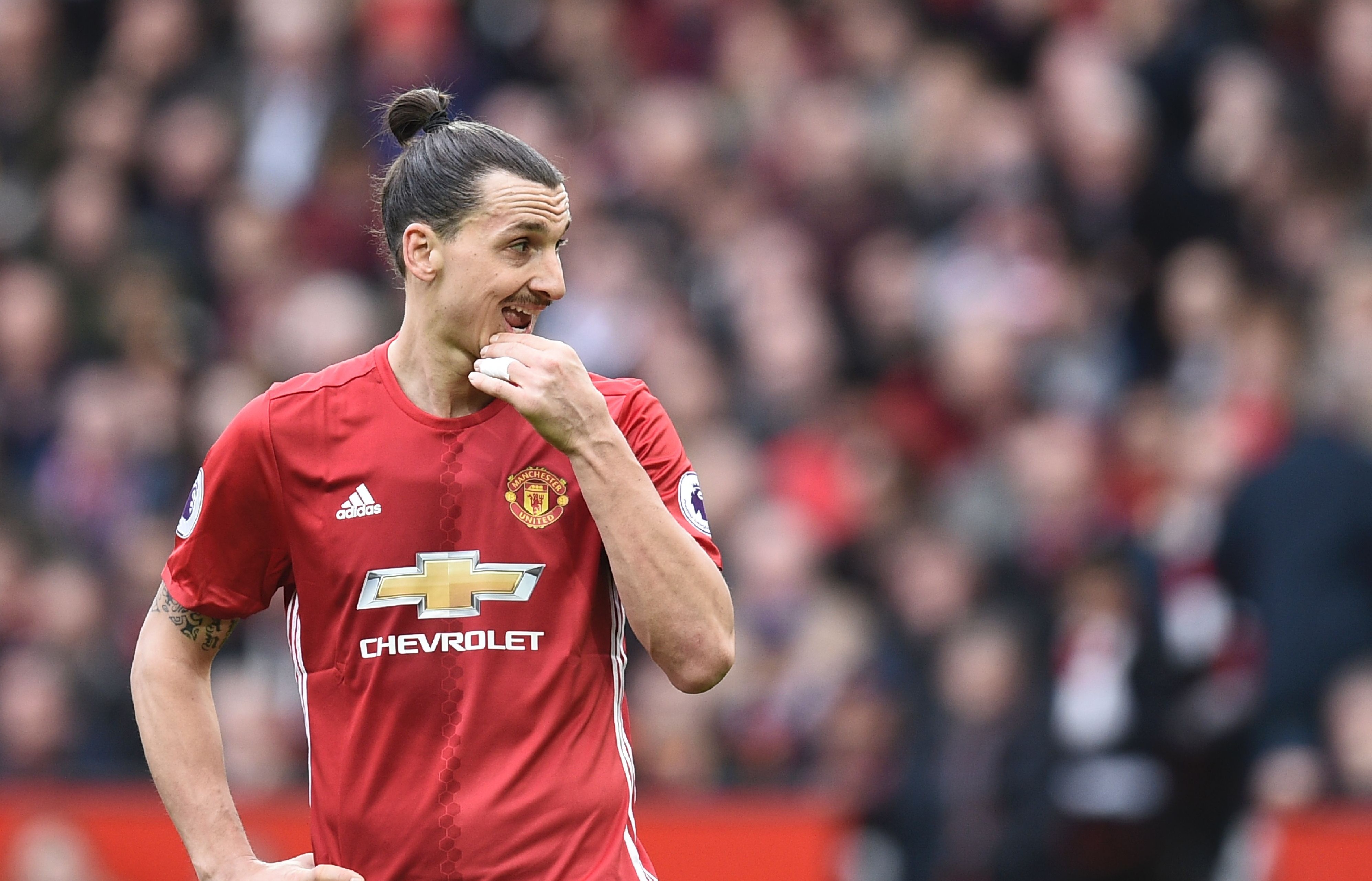 Manchester United's Swedish striker Zlatan Ibrahimovic gestures during the English Premier League football match between Manchester United and Bournemouth at Old Trafford in Manchester, north west England, on March 4, 2017. / AFP PHOTO / Oli SCARFF / RESTRICTED TO EDITORIAL USE. No use with unauthorized audio, video, data, fixture lists, club/league logos or 'live' services. Online in-match use limited to 75 images, no video emulation. No use in betting, games or single club/league/player publications.  /         (Photo credit should read OLI SCARFF/AFP/Getty Images)