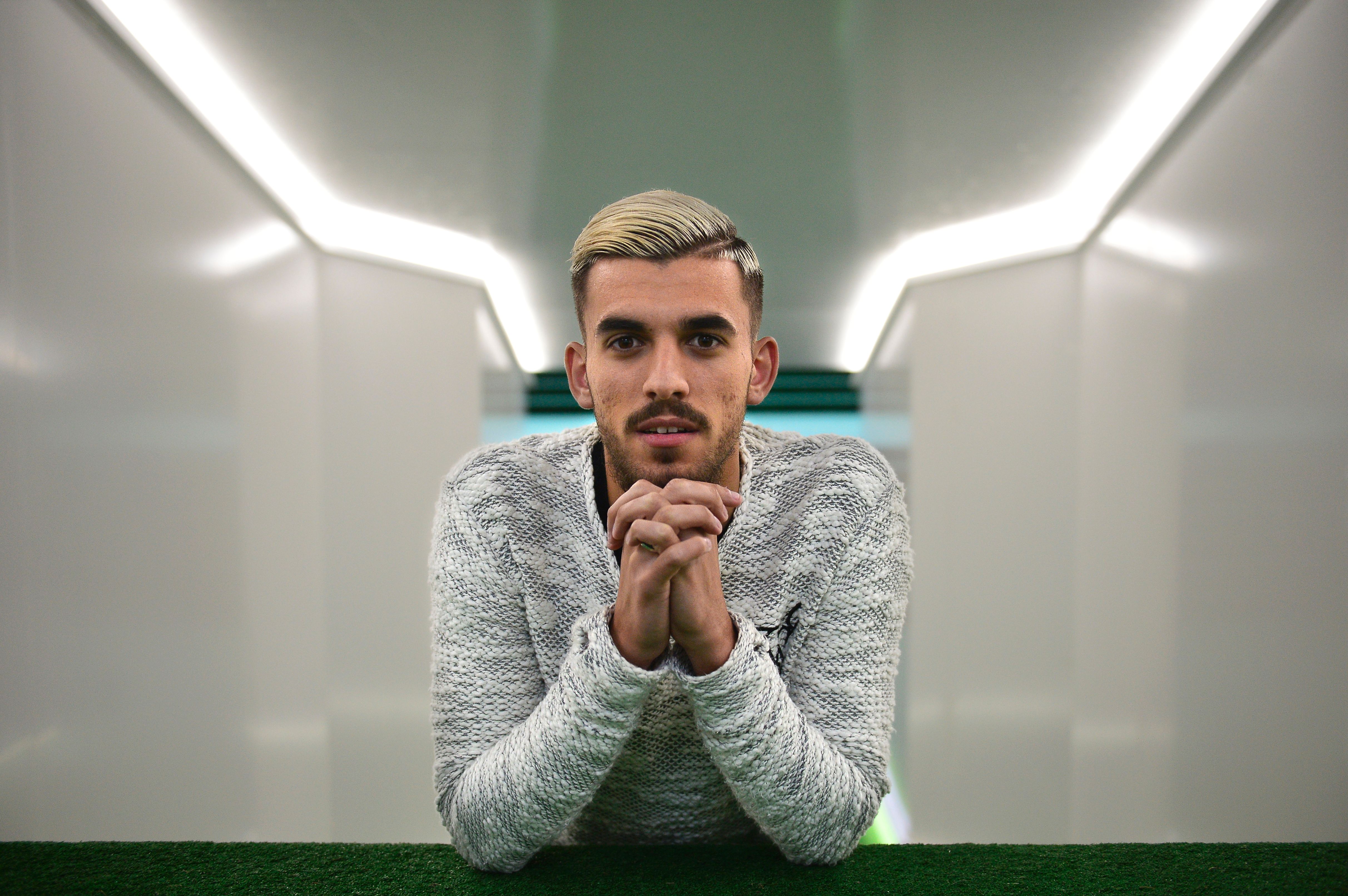 Betis' forward Dani Ceballos poses at the Benito Villamarin stadium, in Sevilla on February 8, 2017.

Seville has two faces: those who like the Holy Week, attending the religious precessions, and those who prefer the April Fair, a spring festival on a flamenco air, between flounced dresses and Traditional outfits. And then there are those who love the green and white of Real Betis Balompie and those who prefer the red and white of Sevilla FC. / AFP / CRISTINA QUICLER        (Photo credit should read CRISTINA QUICLER/AFP/Getty Images)